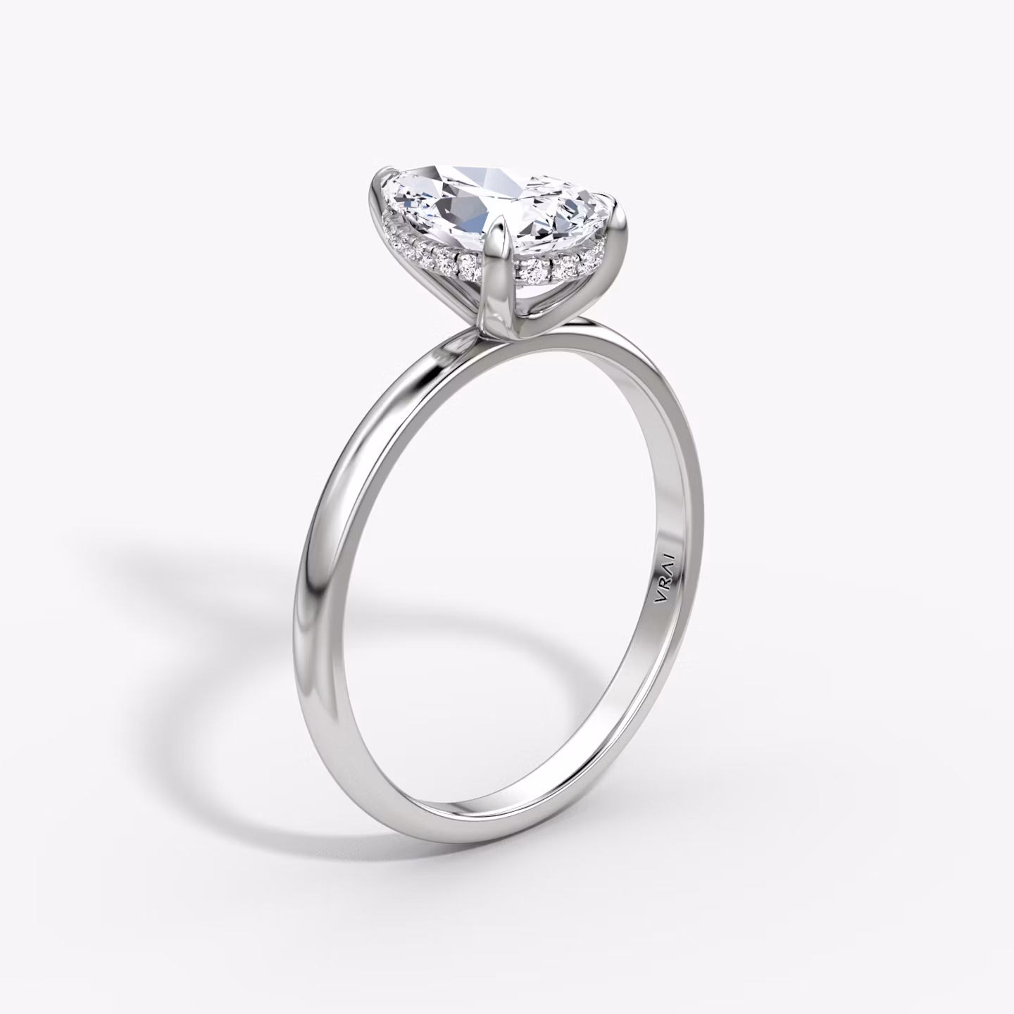 The Classic Hidden Halo | Pear | Platinum | bandAccent: Plain | bandWidth: large | prongStyle: Plain | diamondOrientation: vertical | caratWeight: other