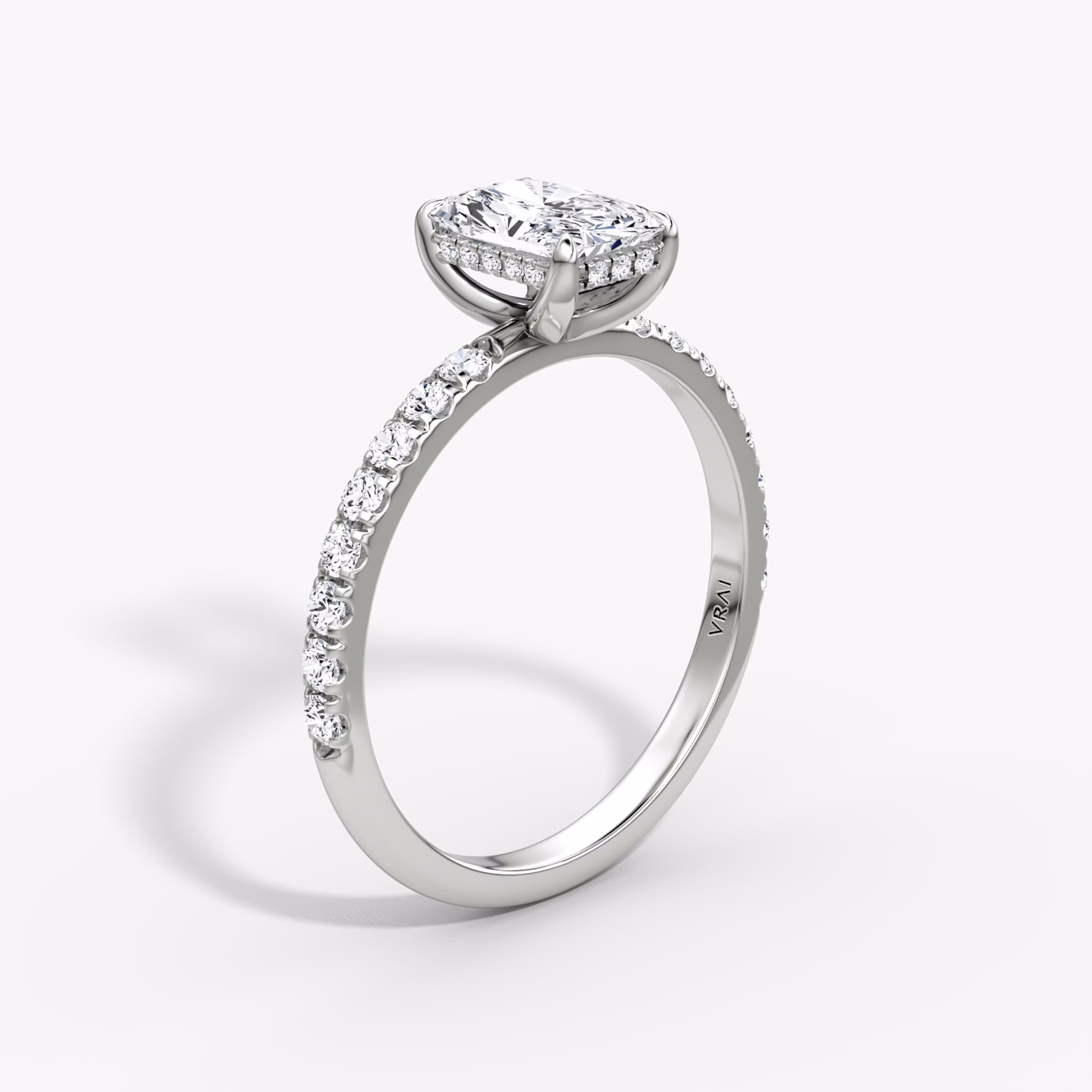 The Classic Hidden Halo | Radiant | 18k | White Gold | bandAccent: Pavé | bandWidth: large | prongStyle: Plain | diamondOrientation: vertical | caratWeight: other
