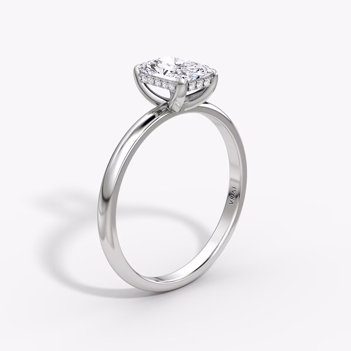 The Classic Hidden Halo | Radiant | Platinum | bandAccent: Plain | bandWidth: large | prongStyle: Plain | diamondOrientation: vertical | caratWeight: other