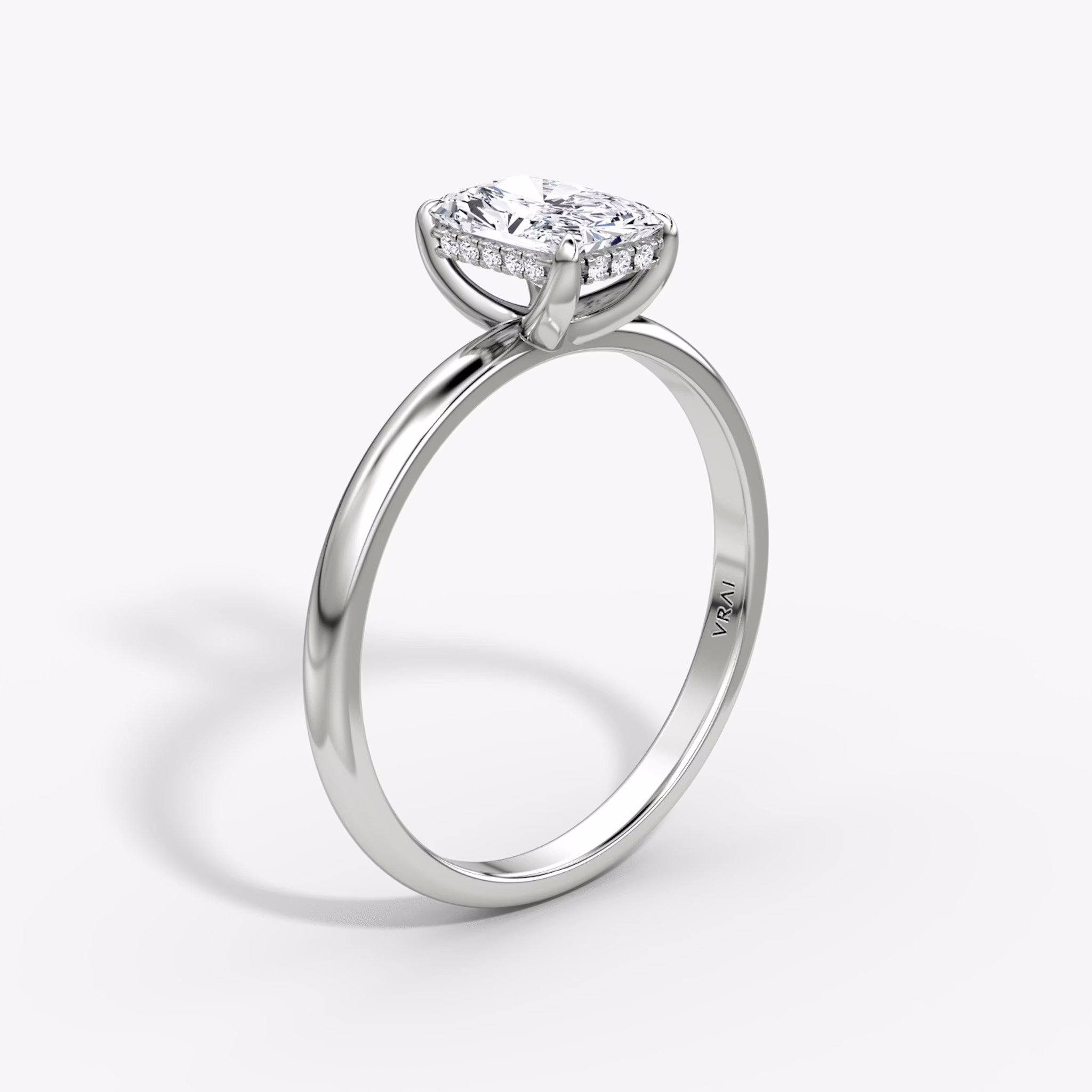 The Classic Hidden Halo | Radiant | 18k | White Gold | bandAccent: Plain | bandWidth: large | prongStyle: Plain | diamondOrientation: vertical | caratWeight: other