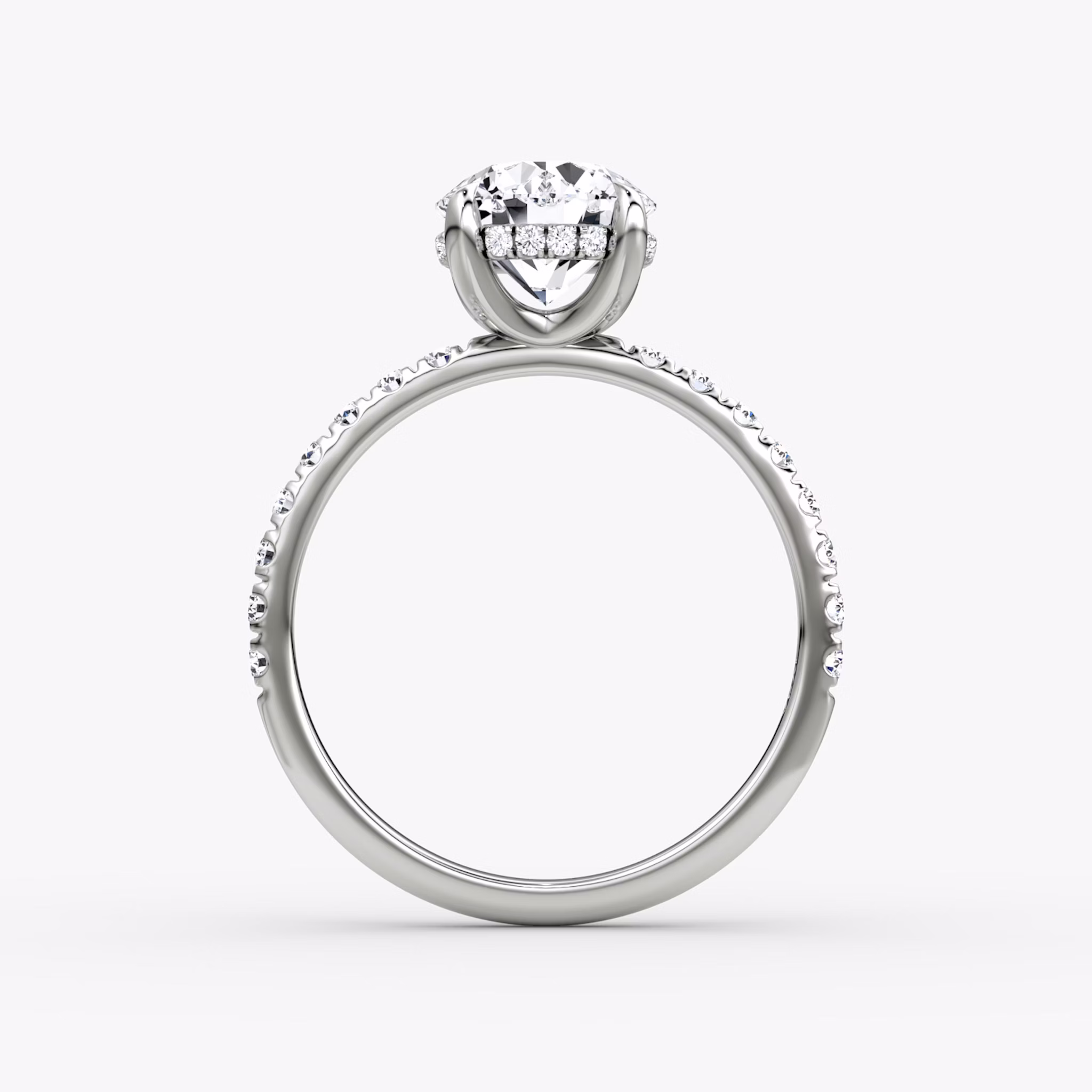 The Classic Hidden Halo | Round Brilliant | Platinum | bandAccent: Pavé | bandWidth: large | caratWeight: 1.0ct | prongStyle: Plain | diamondOrientation: vertical