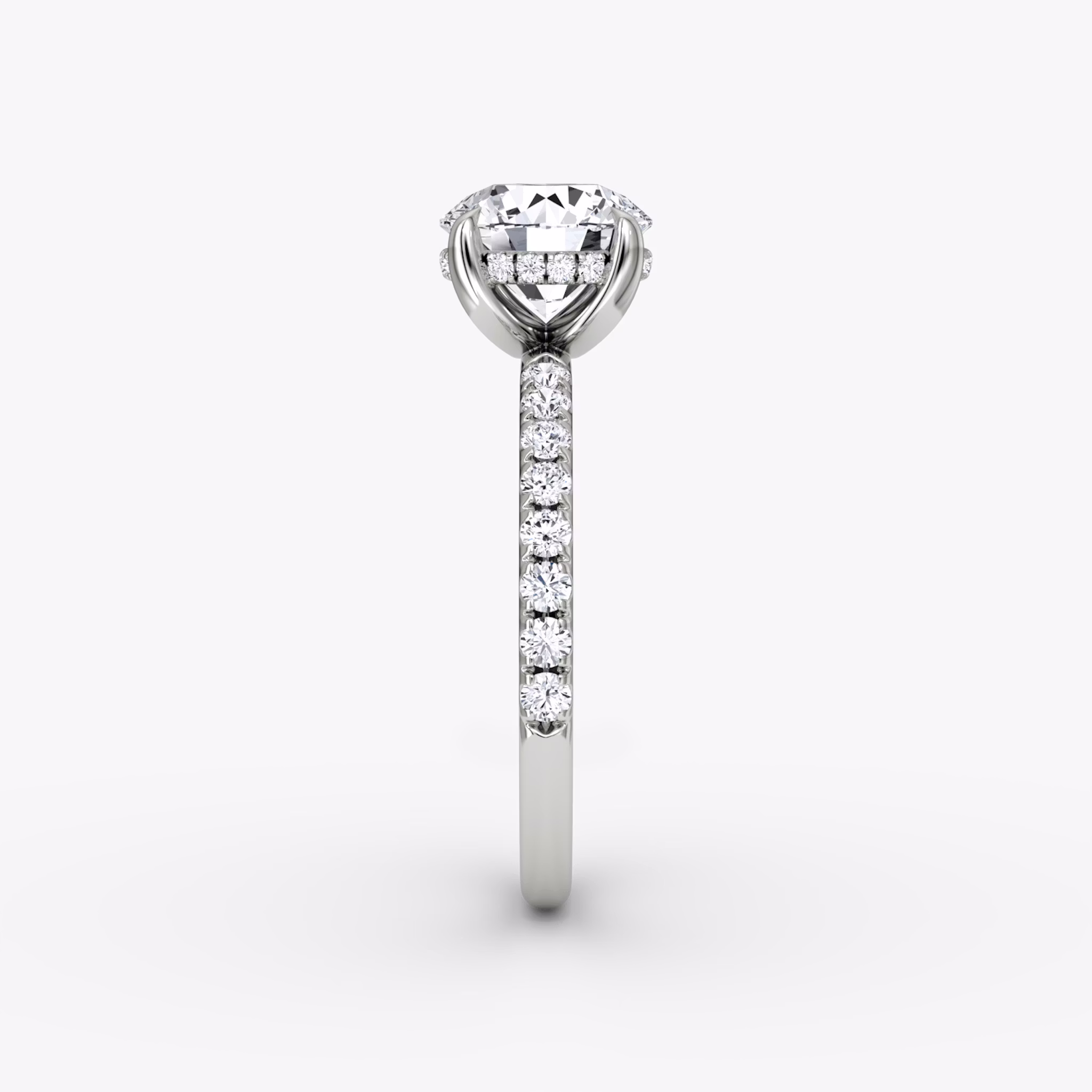 The Classic Hidden Halo | Round Brilliant | Platinum | bandAccent: Pavé | bandWidth: large | caratWeight: 1.0ct | prongStyle: Plain | diamondOrientation: vertical