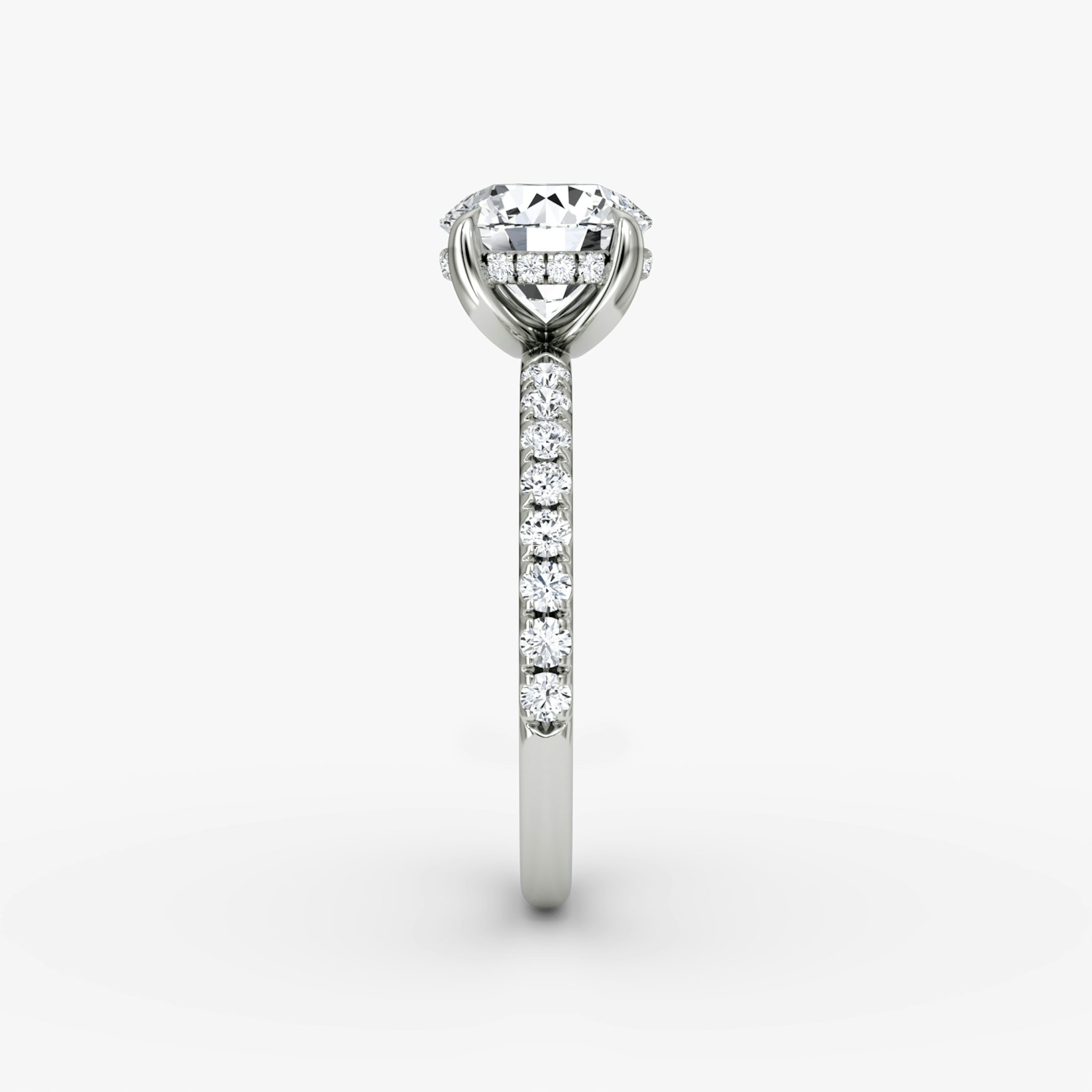 The Classic Hidden Halo | Round Brilliant | Platinum | bandAccent: Pavé | bandWidth: large | caratWeight: 1.0ct | prongStyle: Plain | diamondOrientation: vertical