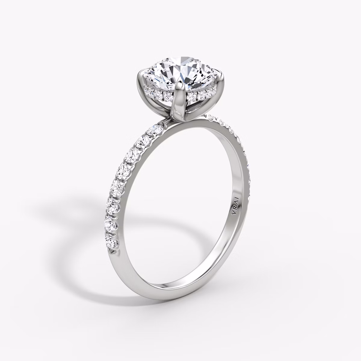 The Classic Hidden Halo | Round Brilliant | 18k | White Gold | bandAccent: Pavé | bandWidth: large | caratWeight: 2.0ct | prongStyle: Plain | diamondOrientation: vertical