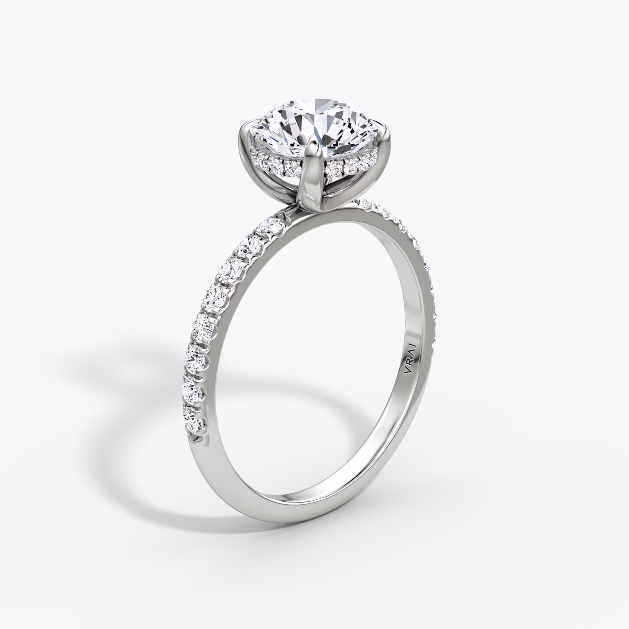 The Classic Hidden Halo | Round Brilliant | Platinum | bandAccent: Pavé | bandWidth: large | caratWeight: 1.0ct | prongStyle: Plain | diamondOrientation: vertical