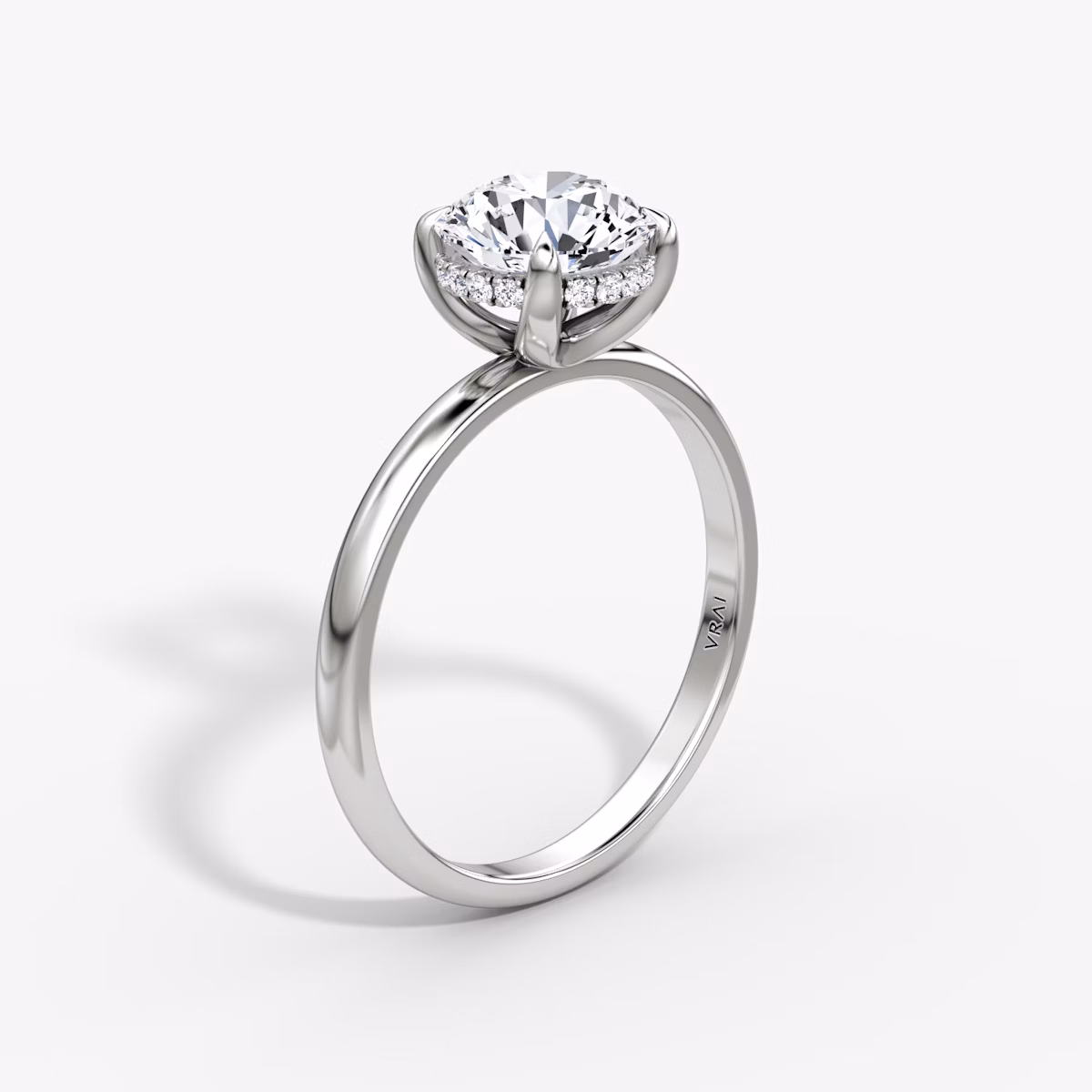 The Classic Hidden Halo | Round Brilliant | 18k | White Gold | bandAccent: Plain | bandWidth: large | caratWeight: 1.5ct | prongStyle: Plain | diamondOrientation: vertical