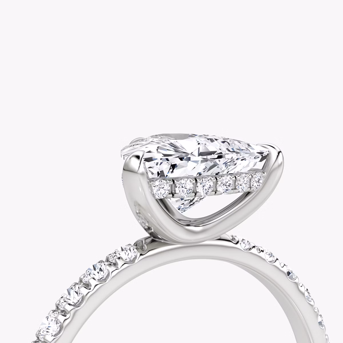 The Classic Hidden Halo | Trillion | Platinum | bandAccent: Pavé | bandWidth: large | prongStyle: Plain | diamondOrientation: vertical | caratWeight: other