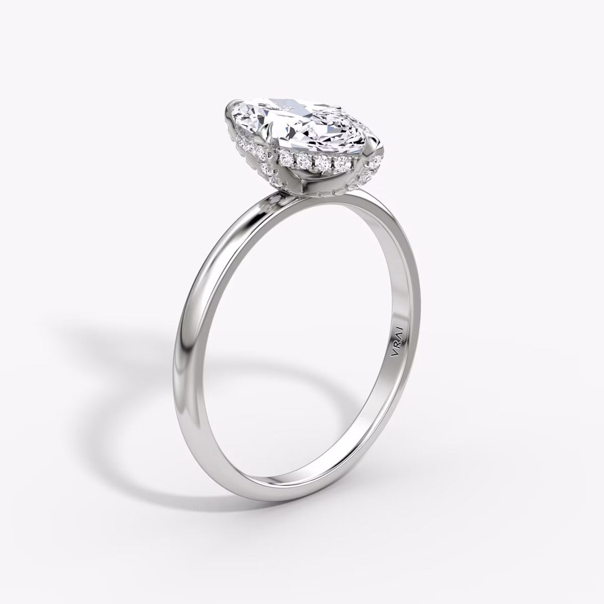 The Classic Hidden Halo | Marquise | Platinum | bandAccent: Plain | bandWidth: large | prongStyle: Pavé | diamondOrientation: vertical | caratWeight: other