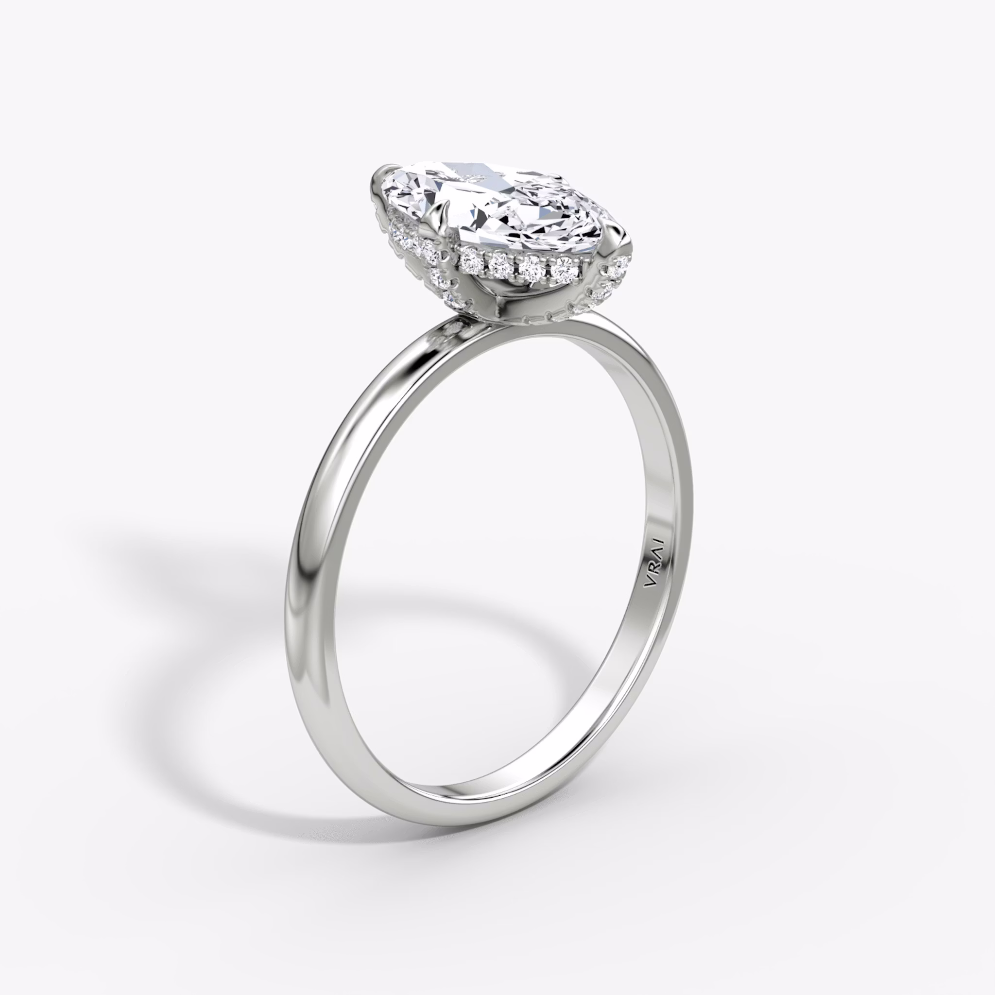 The Classic Hidden Halo | Marquise | 18k | White Gold | bandAccent: Plain | bandWidth: large | prongStyle: Pavé | diamondOrientation: vertical | caratWeight: other
