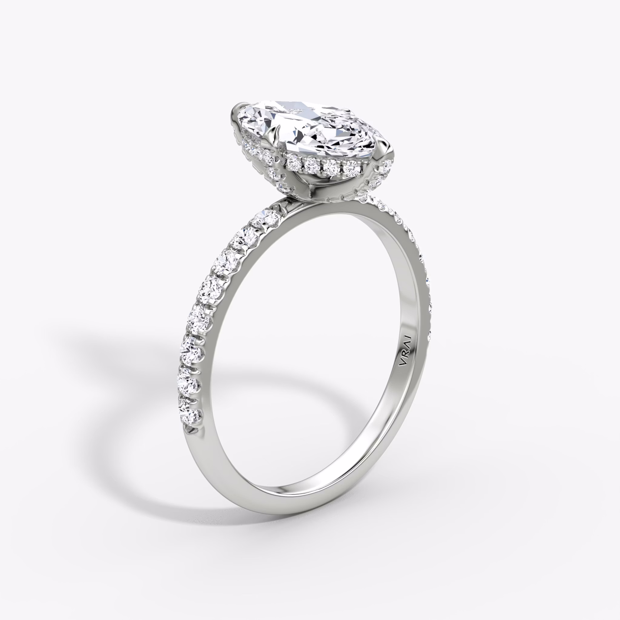 The Classic Hidden Halo | Marquise | 18k | White Gold | bandAccent: Pavé | bandWidth: large | prongStyle: Pavé | diamondOrientation: vertical | caratWeight: other