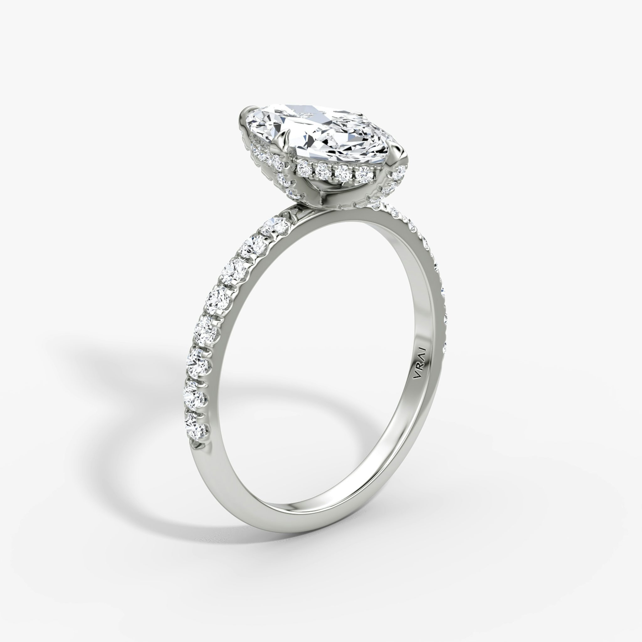 The Classic Hidden Halo | Marquise | 18k | White Gold | bandAccent: Pavé | bandWidth: large | prongStyle: Pavé | diamondOrientation: vertical | caratWeight: other