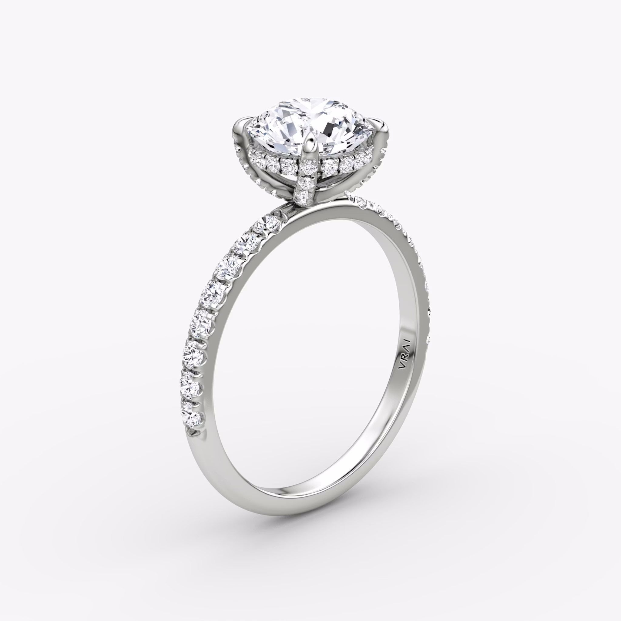 The Classic Hidden Halo | Round Brilliant | 18k | White Gold | bandAccent: Pavé | bandWidth: large | caratWeight: 1.0ct | prongStyle: Pavé | diamondOrientation: vertical