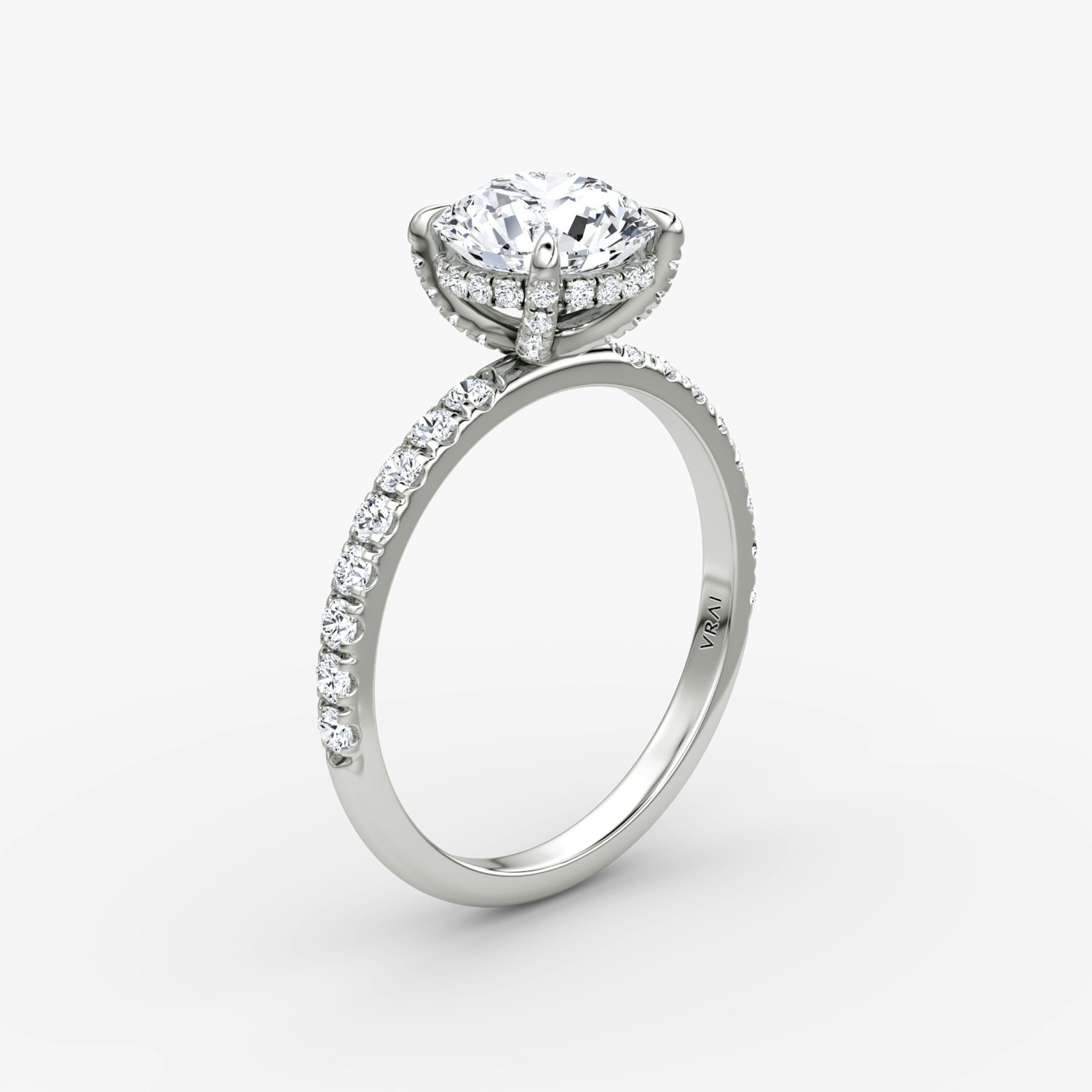 The Classic Hidden Halo | Round Brilliant | 18k | White Gold | bandAccent: Pavé | bandWidth: large | caratWeight: 1.0ct | prongStyle: Pavé | diamondOrientation: vertical
