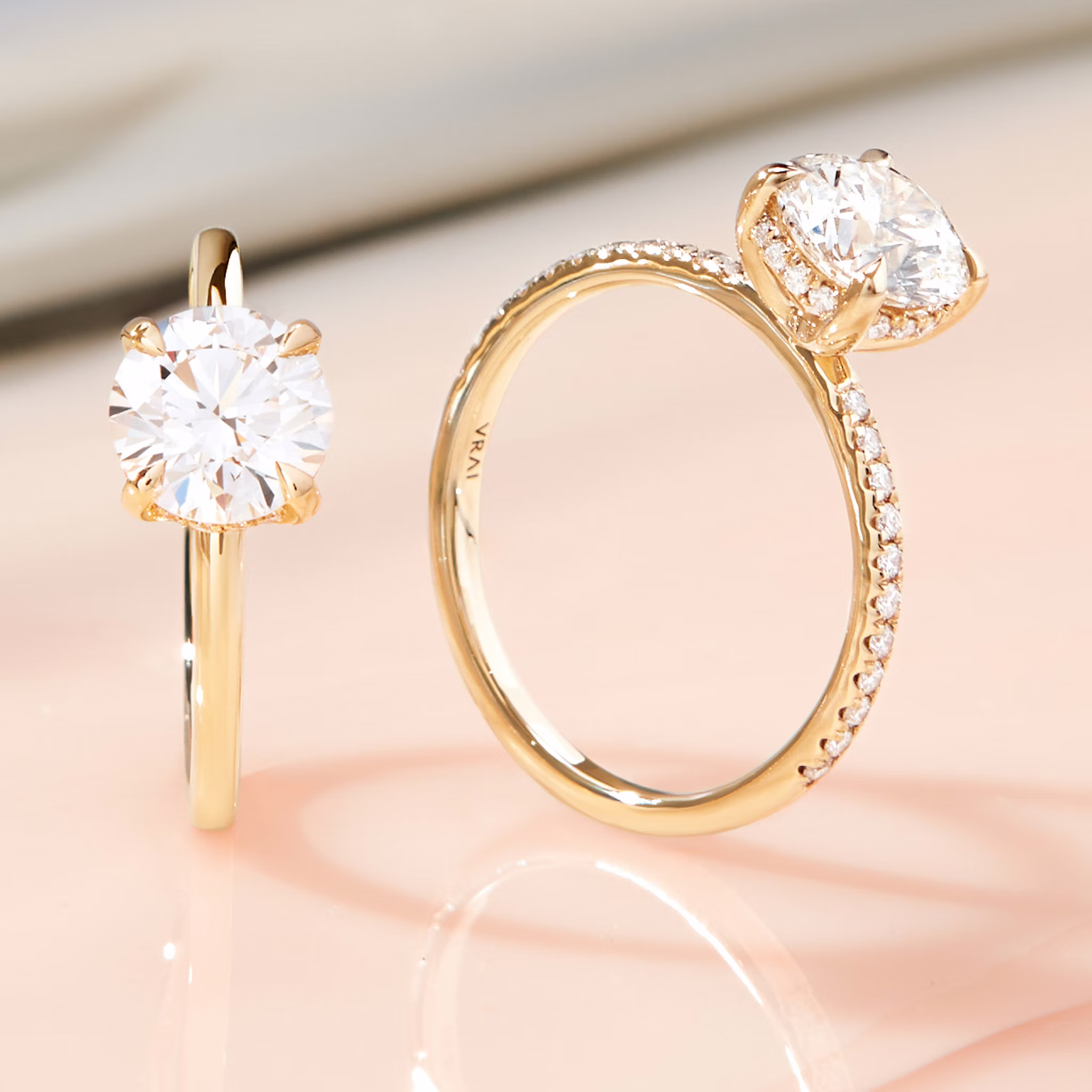 The Classic Hidden Halo | Round Brilliant | Platinum | bandAccent: Pavé | bandWidth: large | caratWeight: 1.0ct | prongStyle: Plain | diamondOrientation: vertical