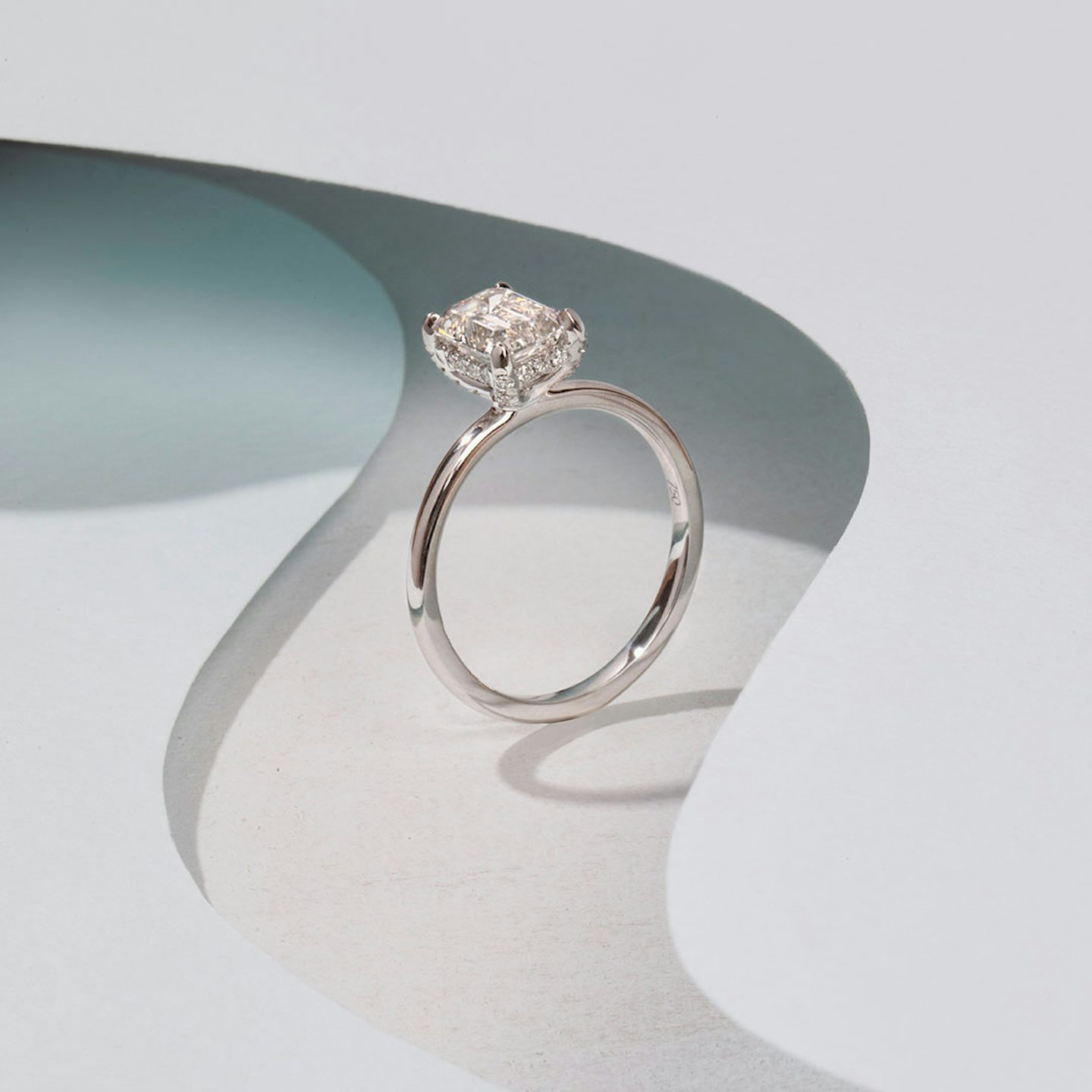 The Classic Hidden Halo | Emerald | 18k | White Gold | bandAccent: Plain | bandWidth: large | prongStyle: Pavé | diamondOrientation: vertical | caratWeight: other
