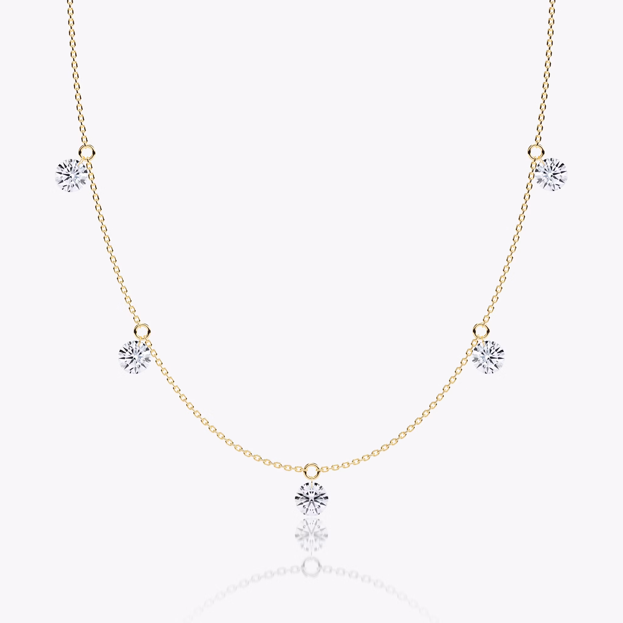 A Floating Station Necklace in white gold.