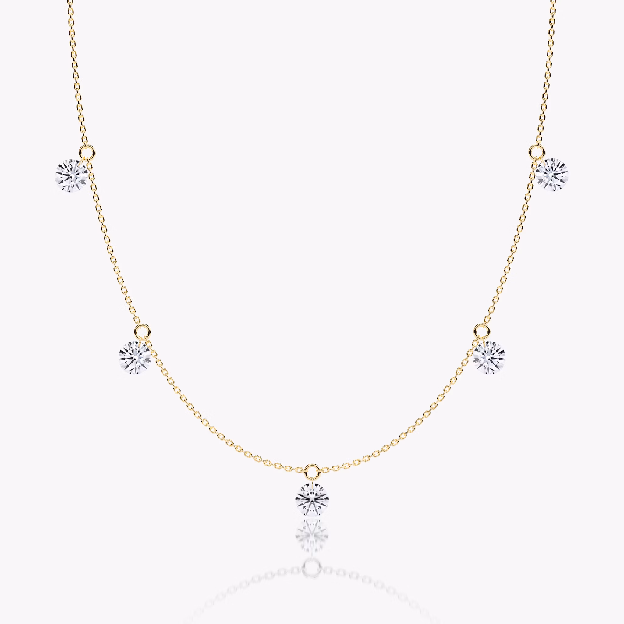 A Floating Station Necklace in white gold.