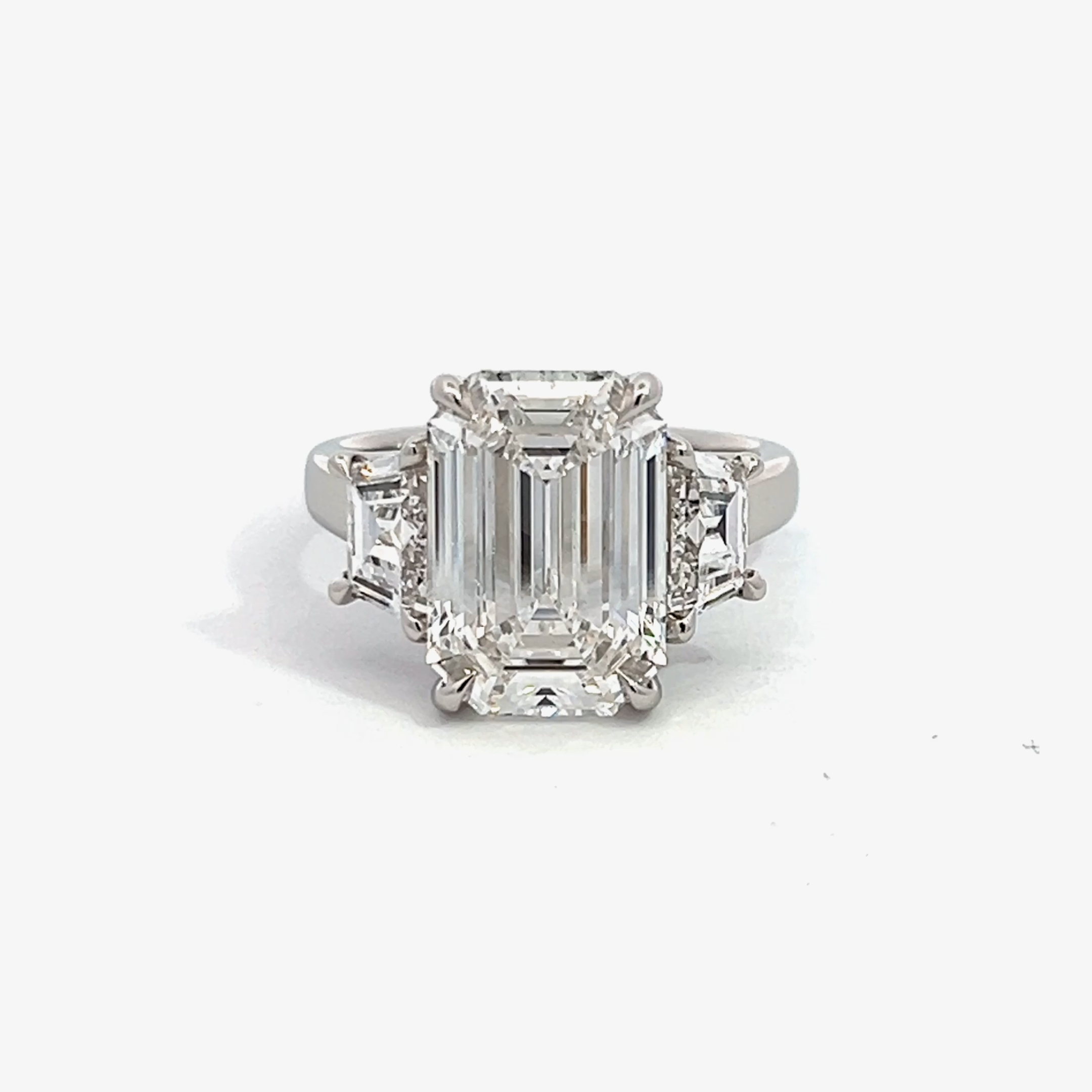 A silver VRAI created diamond ring, with a rectangular diamond.