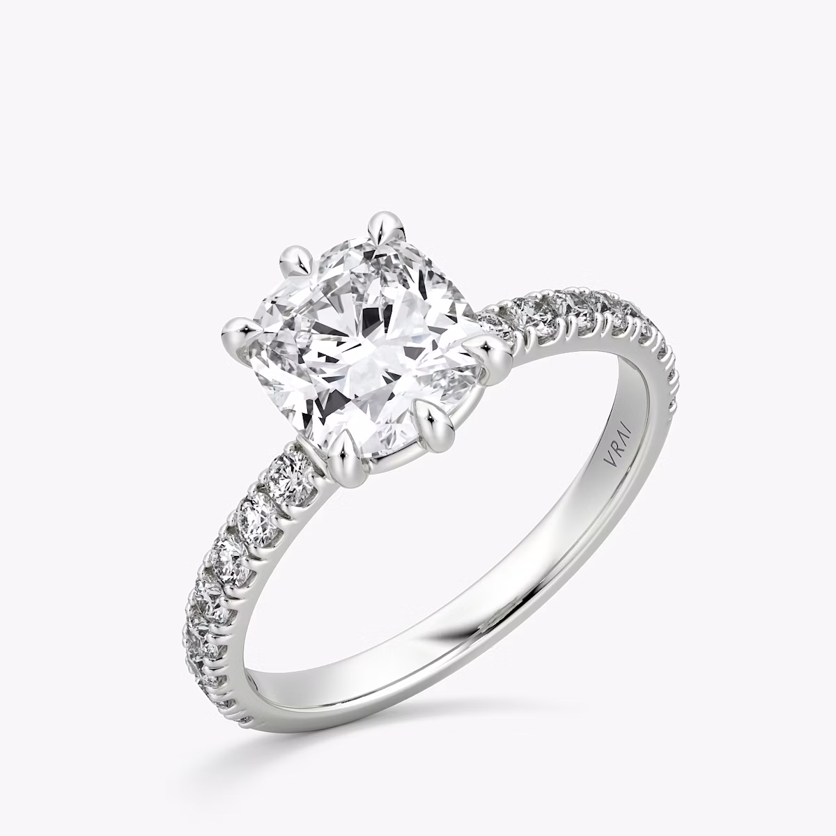 The Signature 6 Prong | Cushion | Platinum | bandAccent: Pavé | bandWidth: large | hiddenHalo: no | diamondOrientation: vertical | caratWeight: other