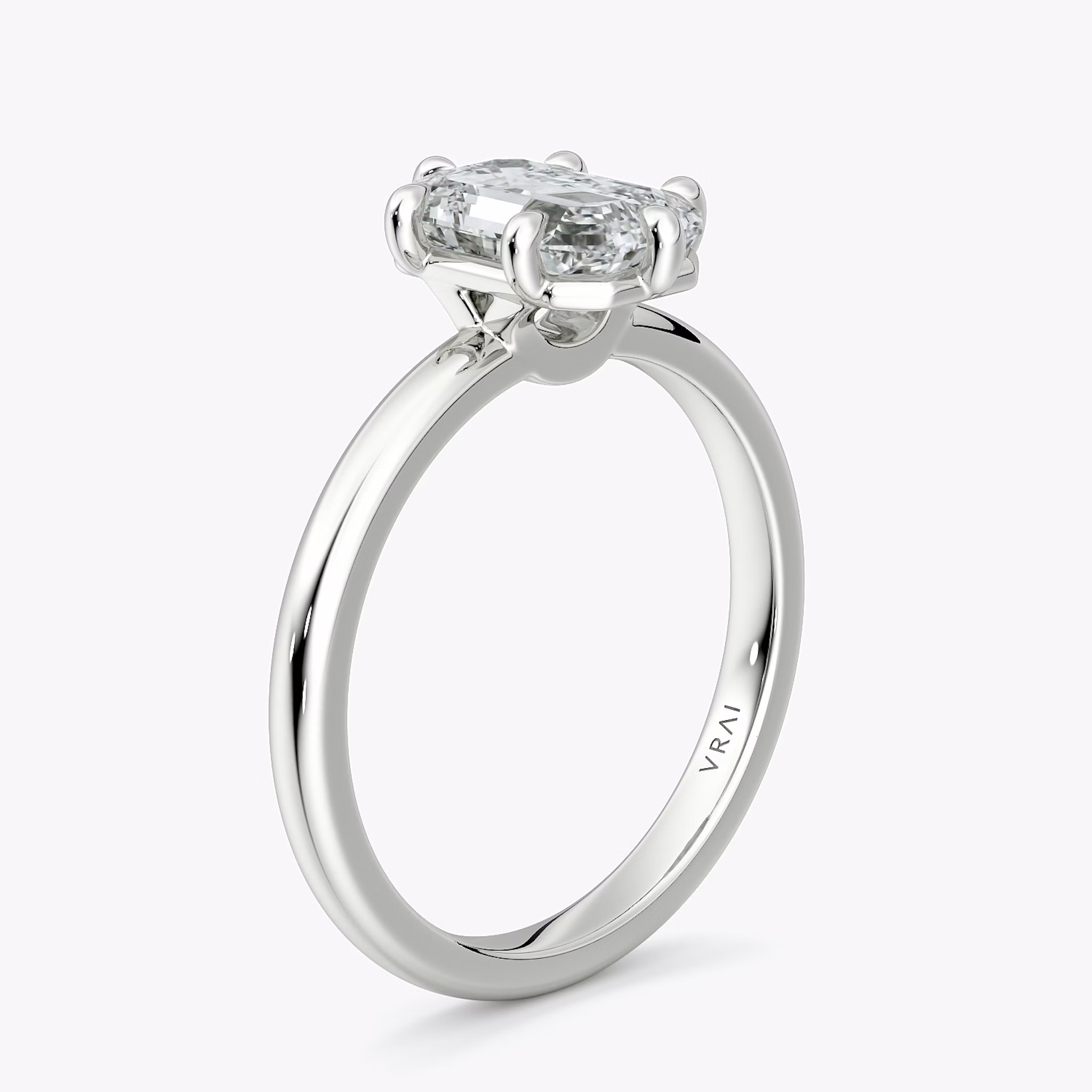 The Signature 6 Prong | Emerald | 18k | White Gold | bandAccent: Plain | bandWidth: large | hiddenHalo: no | diamondOrientation: vertical | caratWeight: other