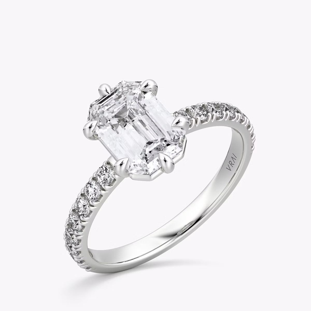 The Signature 6 Prong | Emerald | Platinum | bandAccent: Pavé | bandWidth: large | hiddenHalo: no | diamondOrientation: vertical | caratWeight: other