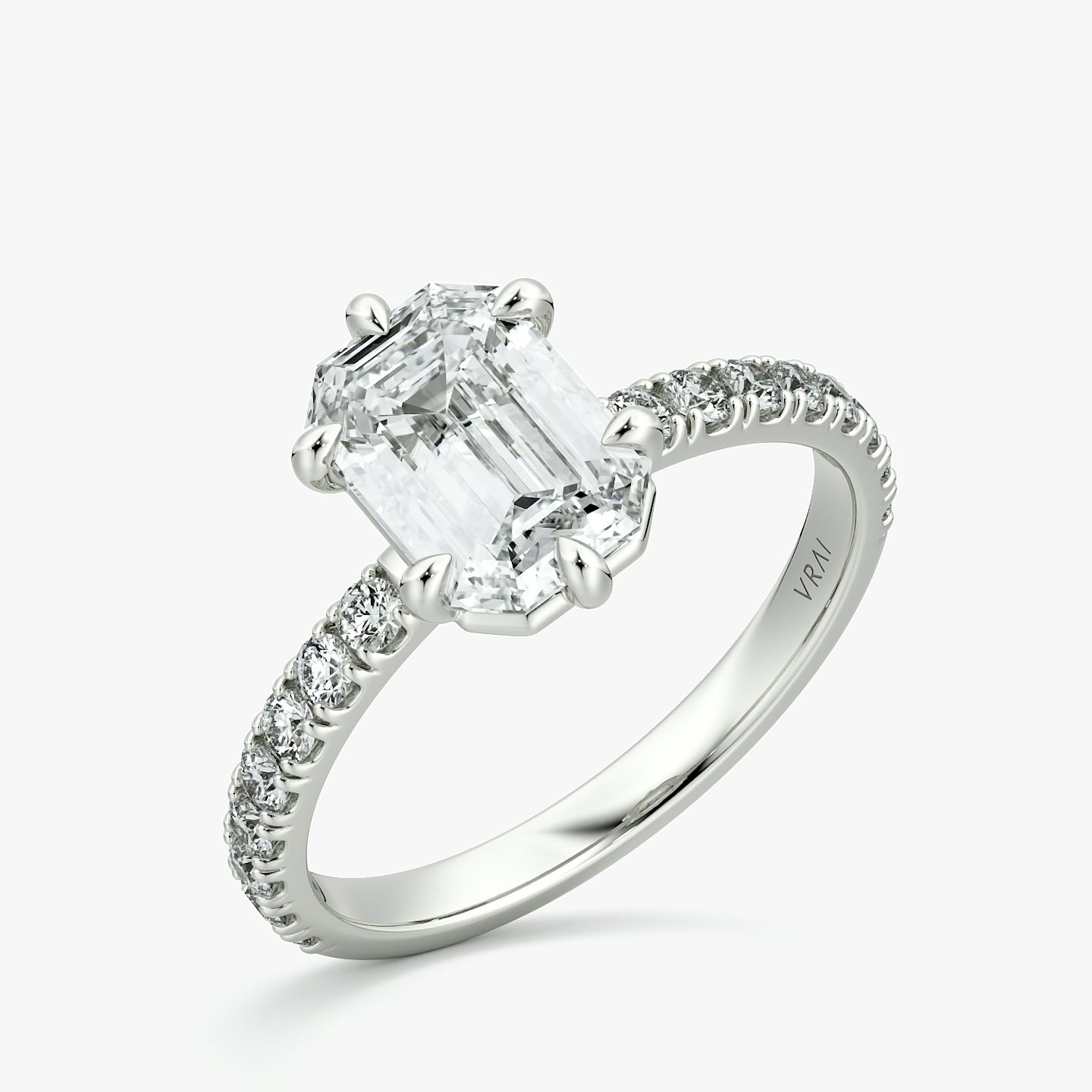 The Signature 6 Prong | Emerald | Platinum | bandAccent: Pavé | bandWidth: large | hiddenHalo: no | diamondOrientation: vertical | caratWeight: other