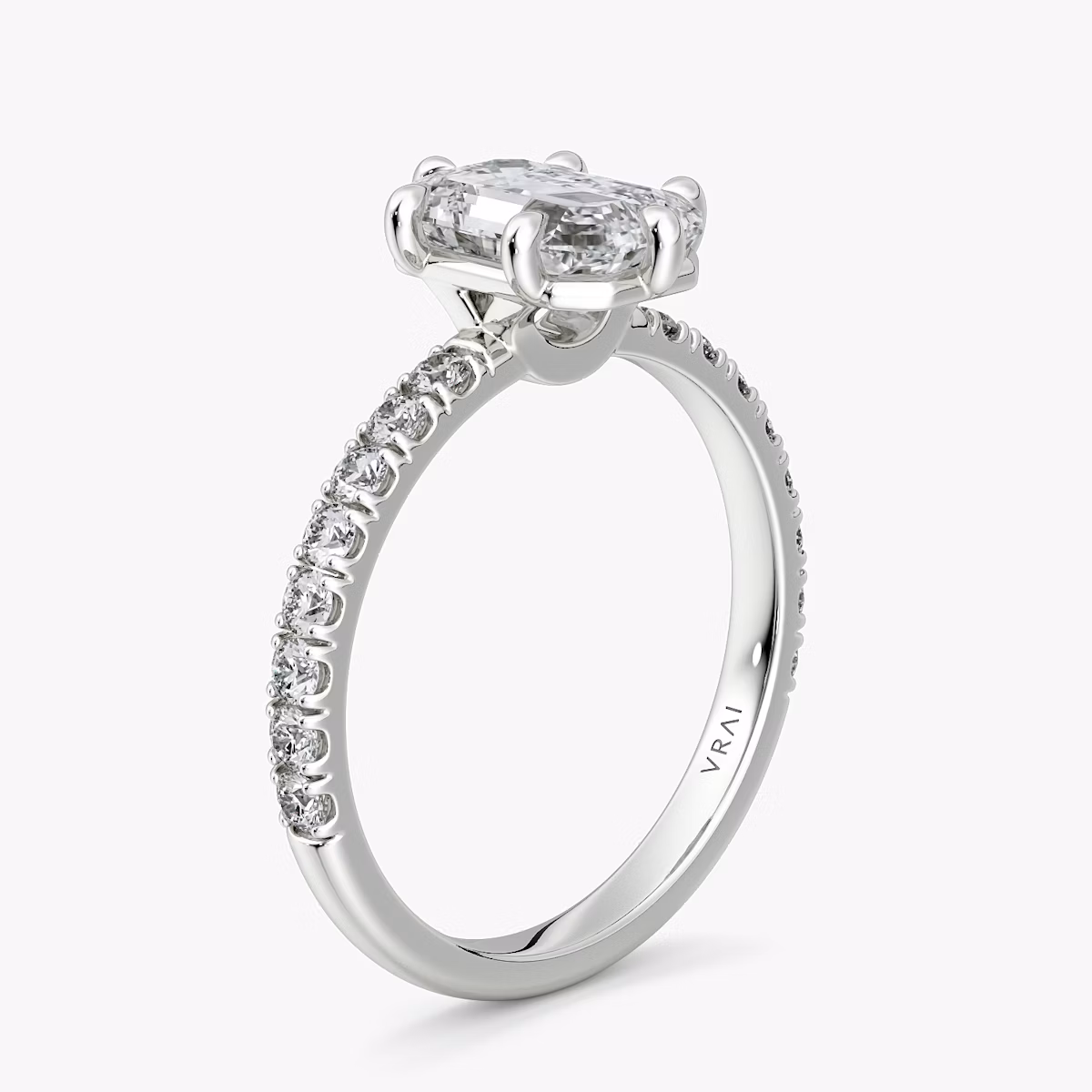 The Signature 6 Prong | Emerald | Platinum | bandAccent: Pavé | bandWidth: large | hiddenHalo: no | diamondOrientation: vertical | caratWeight: other