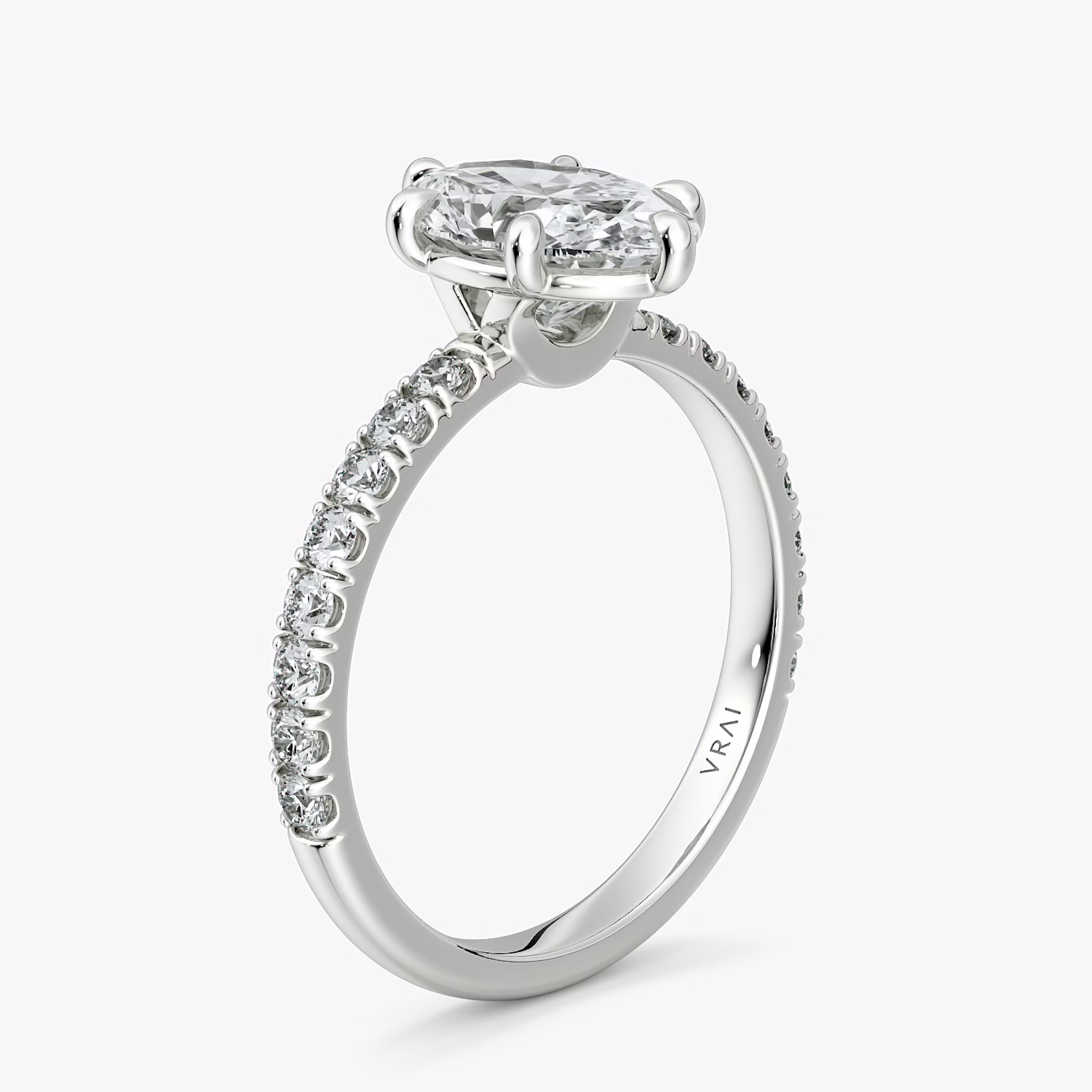 The Signature 6 Prong | Oval | 18k | White Gold | bandAccent: Pavé | bandWidth: large | hiddenHalo: no | diamondOrientation: vertical | caratWeight: other