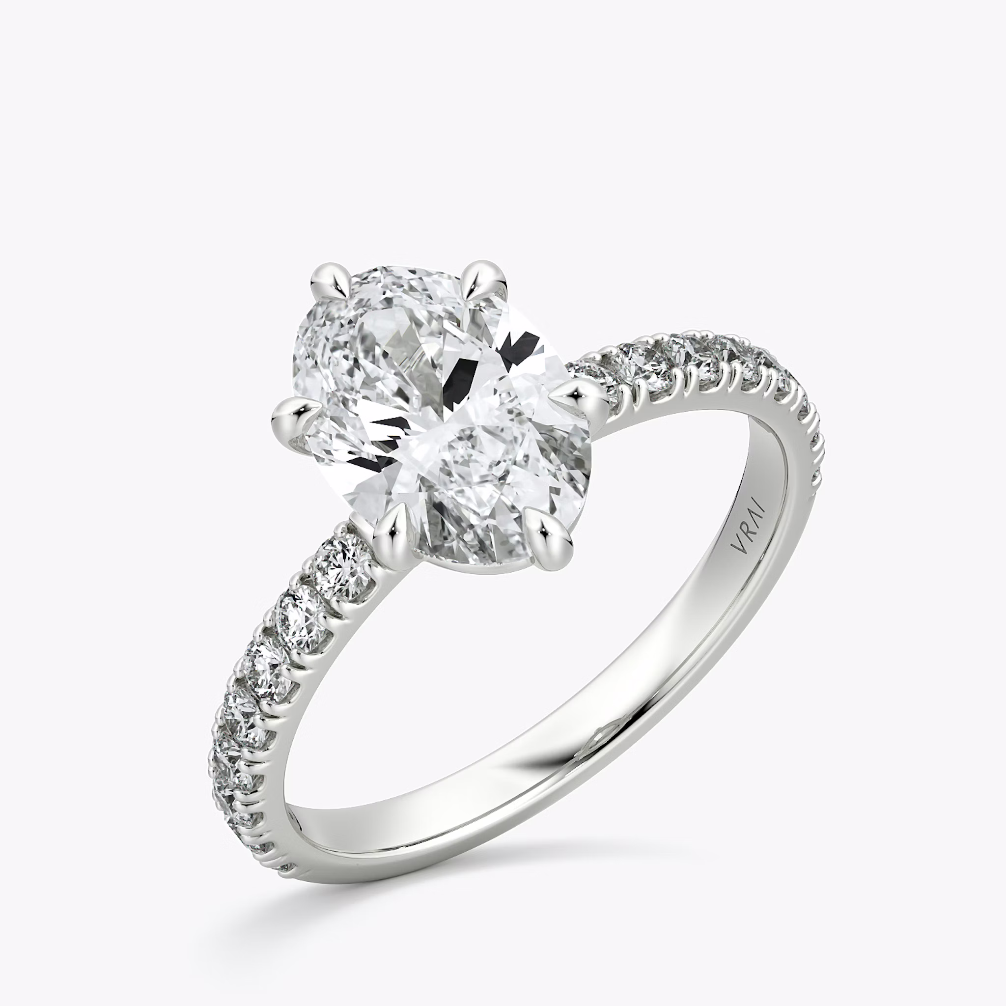 The Signature 6 Prong | Oval | 18k | White Gold | bandAccent: Pavé | bandWidth: large | hiddenHalo: no | diamondOrientation: vertical | caratWeight: other