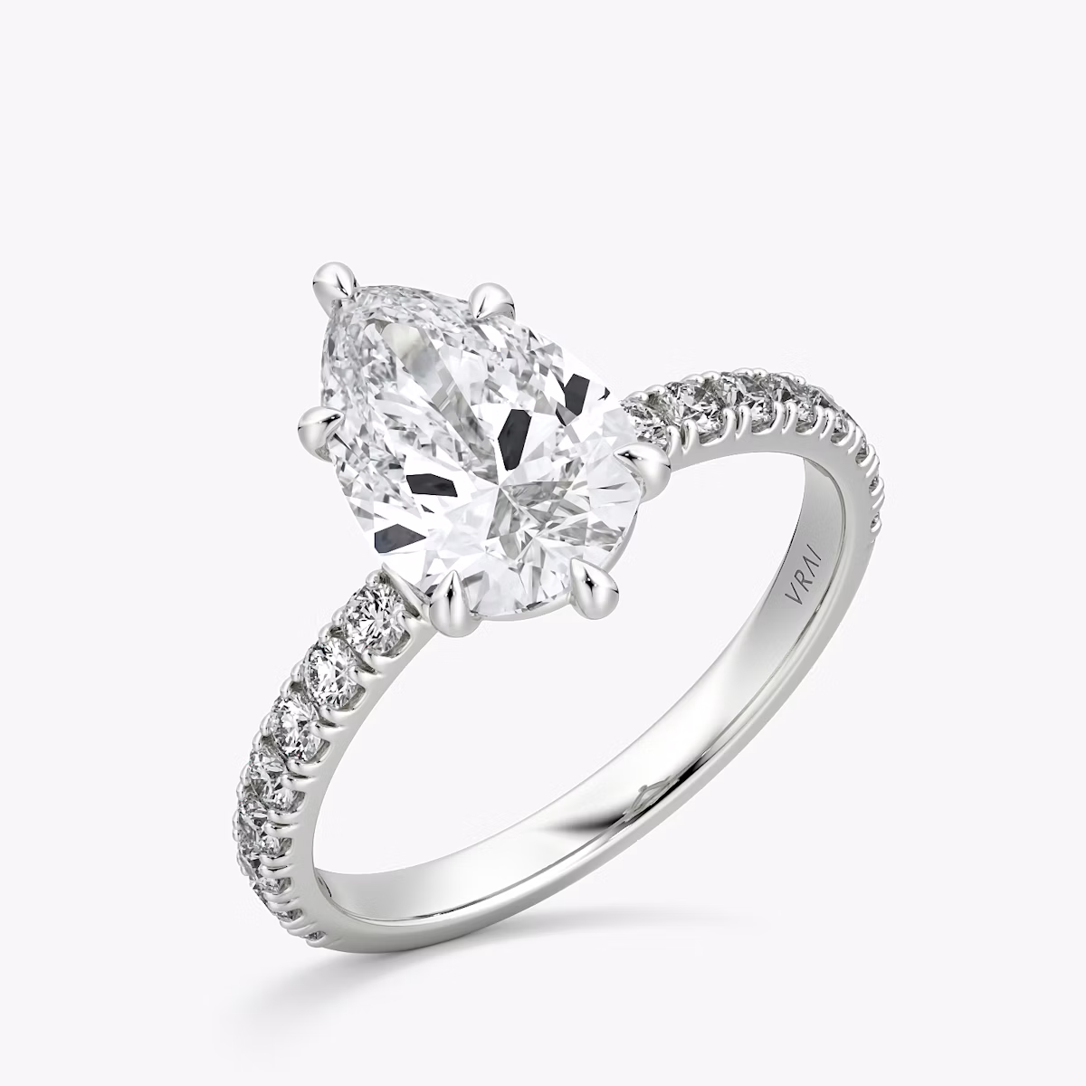 The Signature 6 Prong | Pear | Platinum | bandAccent: Pavé | bandWidth: large | hiddenHalo: no | diamondOrientation: vertical | caratWeight: other
