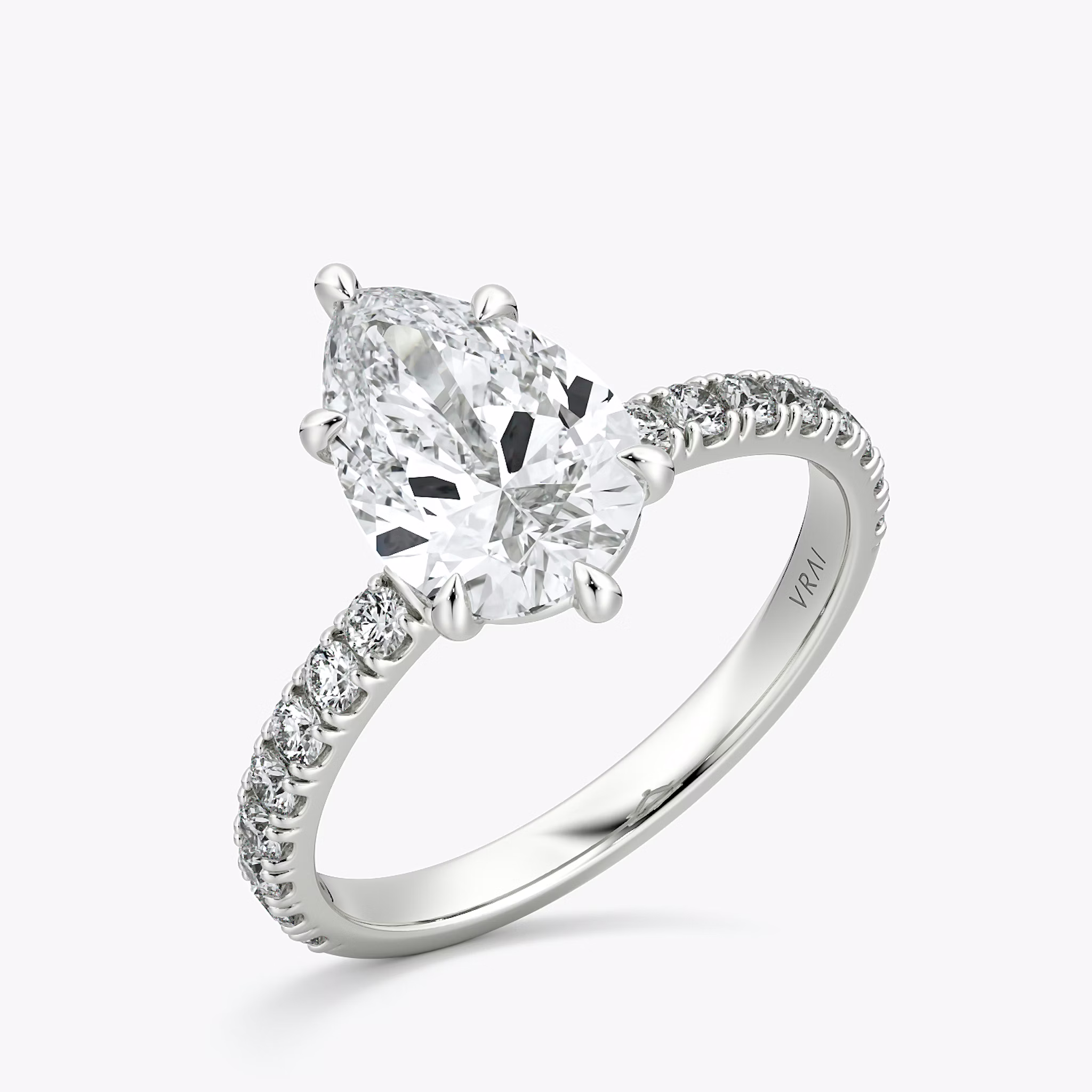 The Signature 6 Prong | Pear | 18k | White Gold | bandAccent: Pavé | bandWidth: large | hiddenHalo: no | diamondOrientation: vertical | caratWeight: other