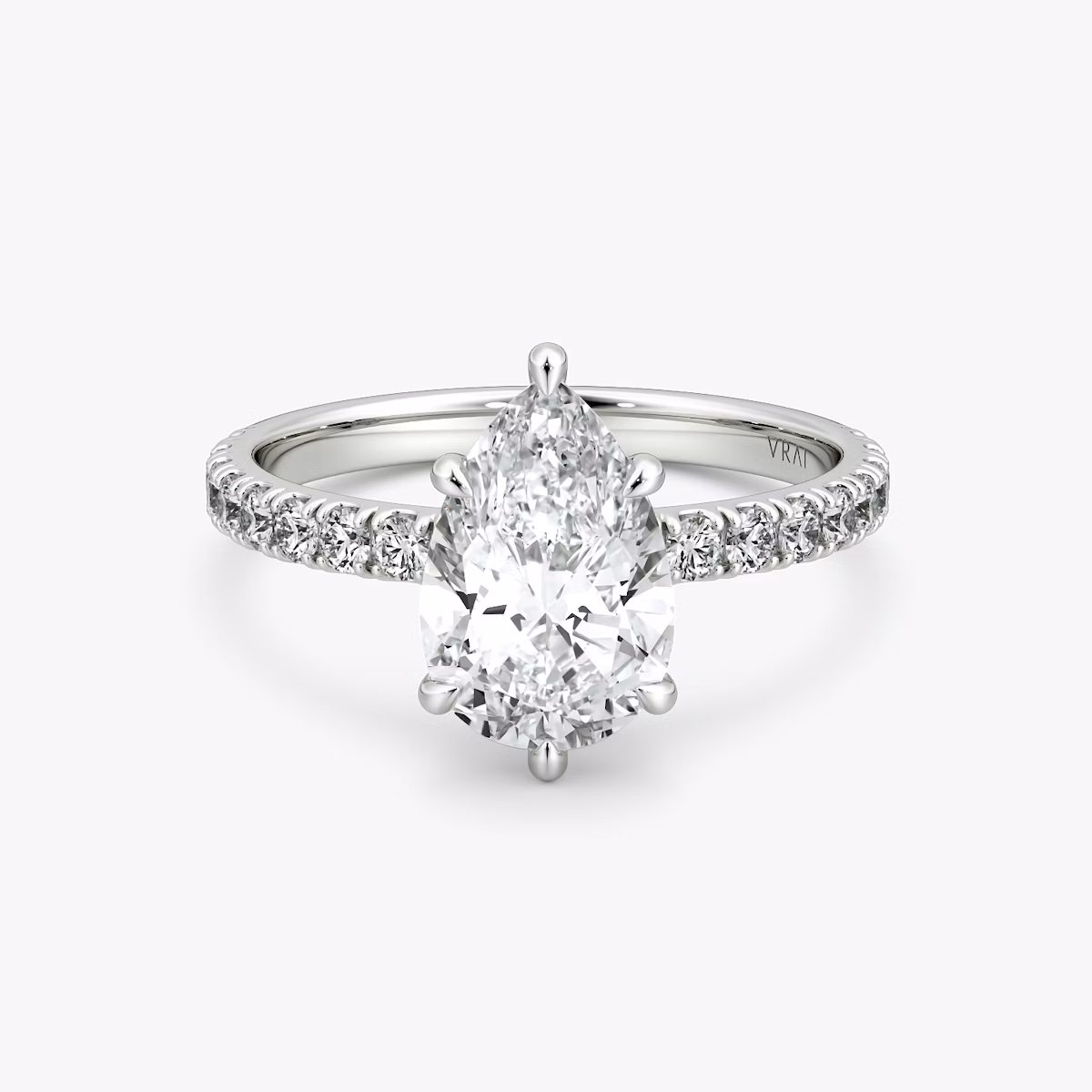 The Signature 6 Prong | Pear | Platinum | bandAccent: Pavé | bandWidth: large | hiddenHalo: no | diamondOrientation: vertical | caratWeight: other