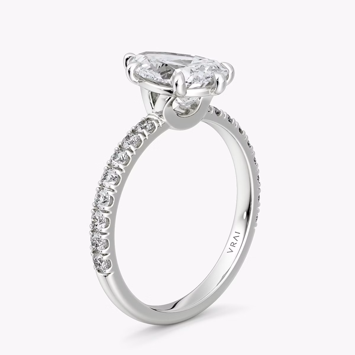 The Signature 6 Prong | Pear | Platinum | bandAccent: Pavé | bandWidth: large | hiddenHalo: no | diamondOrientation: vertical | caratWeight: other