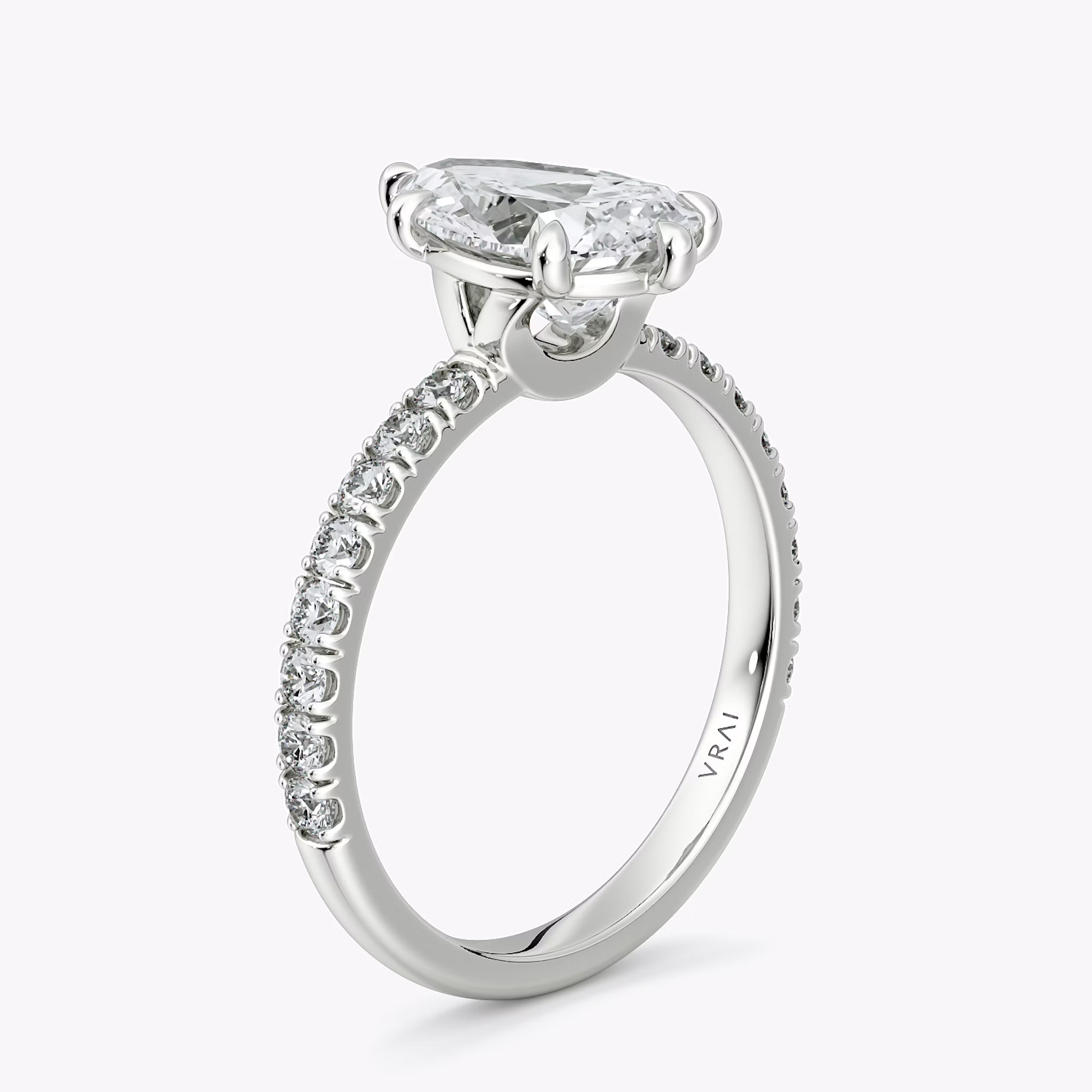 The Signature 6 Prong | Pear | 18k | White Gold | bandAccent: Pavé | bandWidth: large | hiddenHalo: no | diamondOrientation: vertical | caratWeight: other