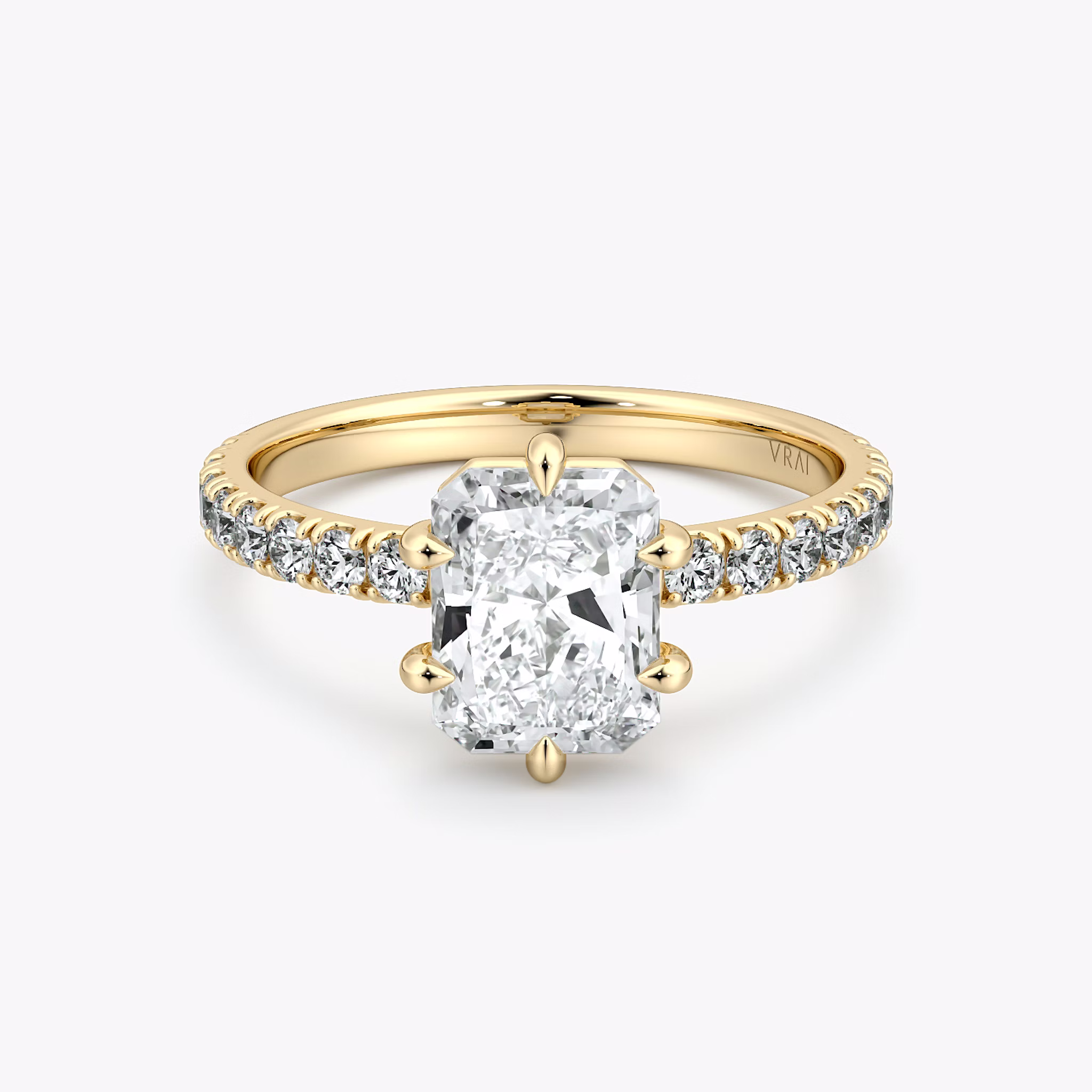 Radiant-cut diamond ring with pavé 2.1mm band and six prongs in yellow gold, VRAI Signature 6-Prong setting.