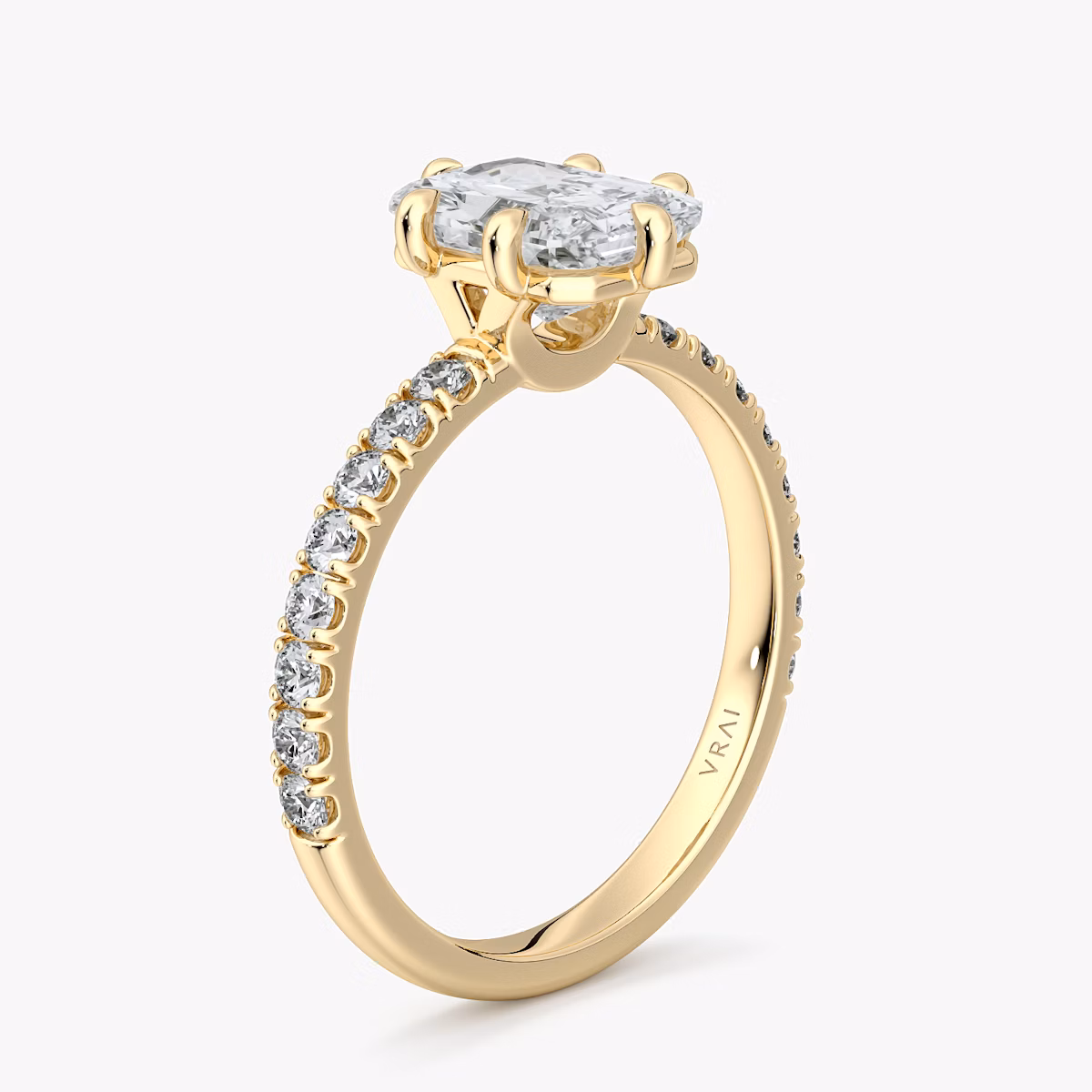 Radiant-cut diamond ring with pavé 2.1mm band and six prongs in yellow gold, VRAI Signature 6-Prong setting.