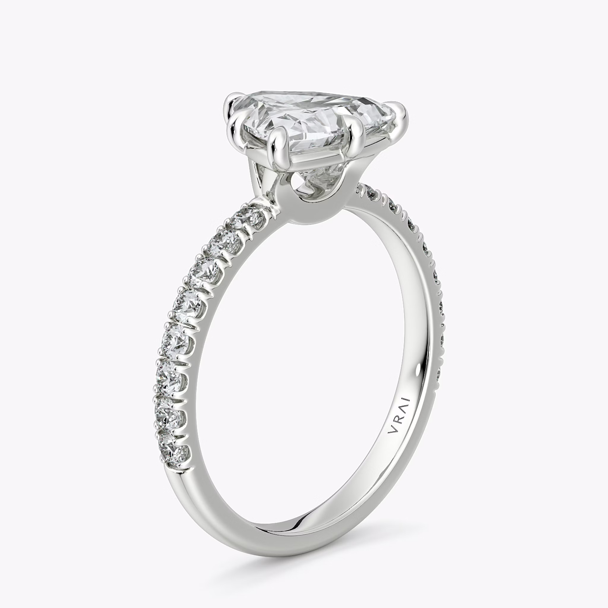 The Signature 6 Prong | Trillion | 18k | White Gold | bandAccent: Pavé | bandWidth: large | hiddenHalo: no | diamondOrientation: vertical | caratWeight: other