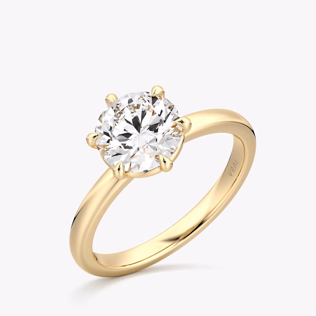 The Signature 6 Prong | Round Brilliant | 18k | Yellow Gold | bandAccent: Plain | bandWidth: large | caratWeight: 1.0ct | hiddenHalo: no | diamondOrientation: vertical