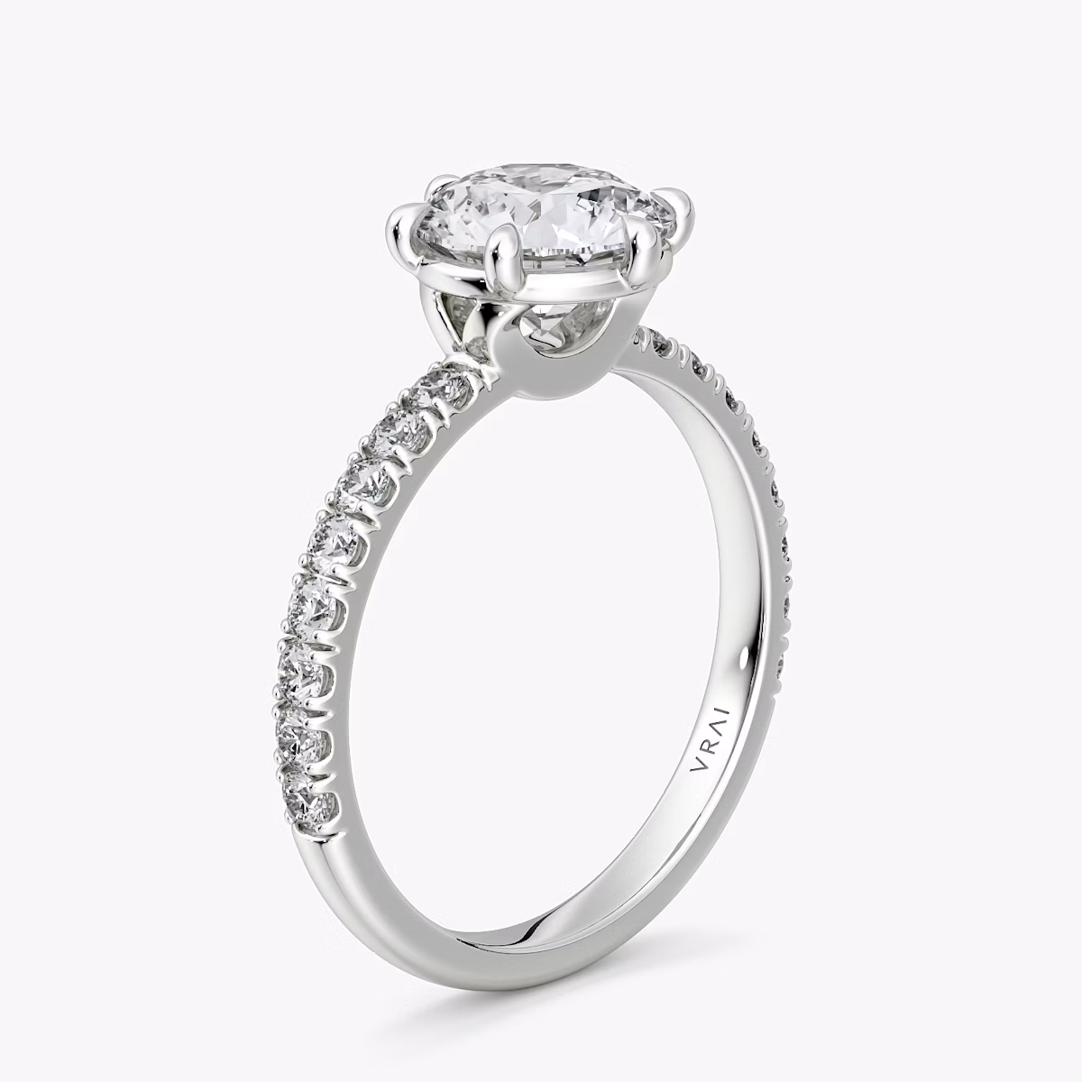 The Signature 6 Prong | Round Brilliant | 18k | White Gold | bandAccent: Pavé | bandWidth: large | caratWeight: other | hiddenHalo: no | diamondOrientation: vertical