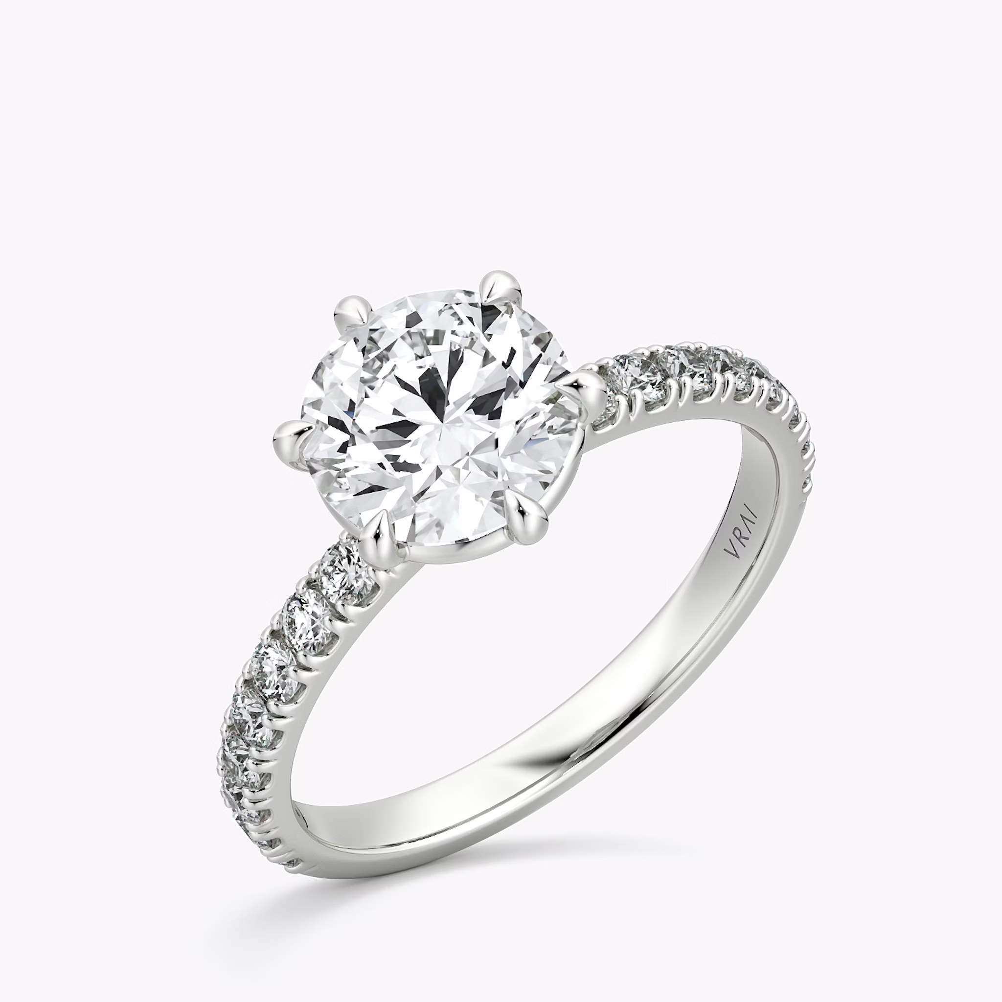The Signature 6 Prong | Round Brilliant | 18k | White Gold | bandAccent: Pavé | bandWidth: large | caratWeight: other | hiddenHalo: no | diamondOrientation: vertical