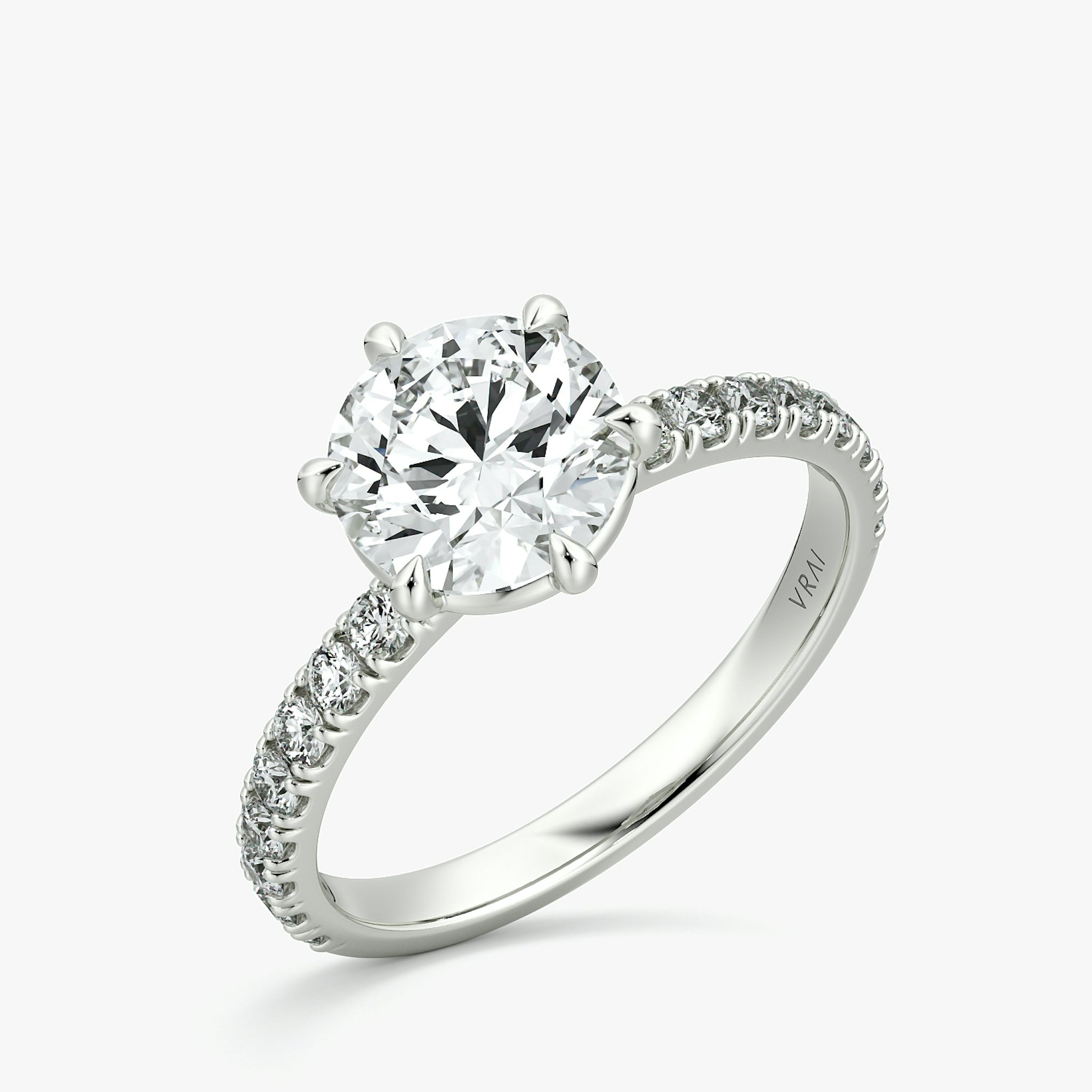 The Signature 6 Prong | Round Brilliant | 18k | White Gold | bandAccent: Pavé | bandWidth: large | caratWeight: other | hiddenHalo: no | diamondOrientation: vertical