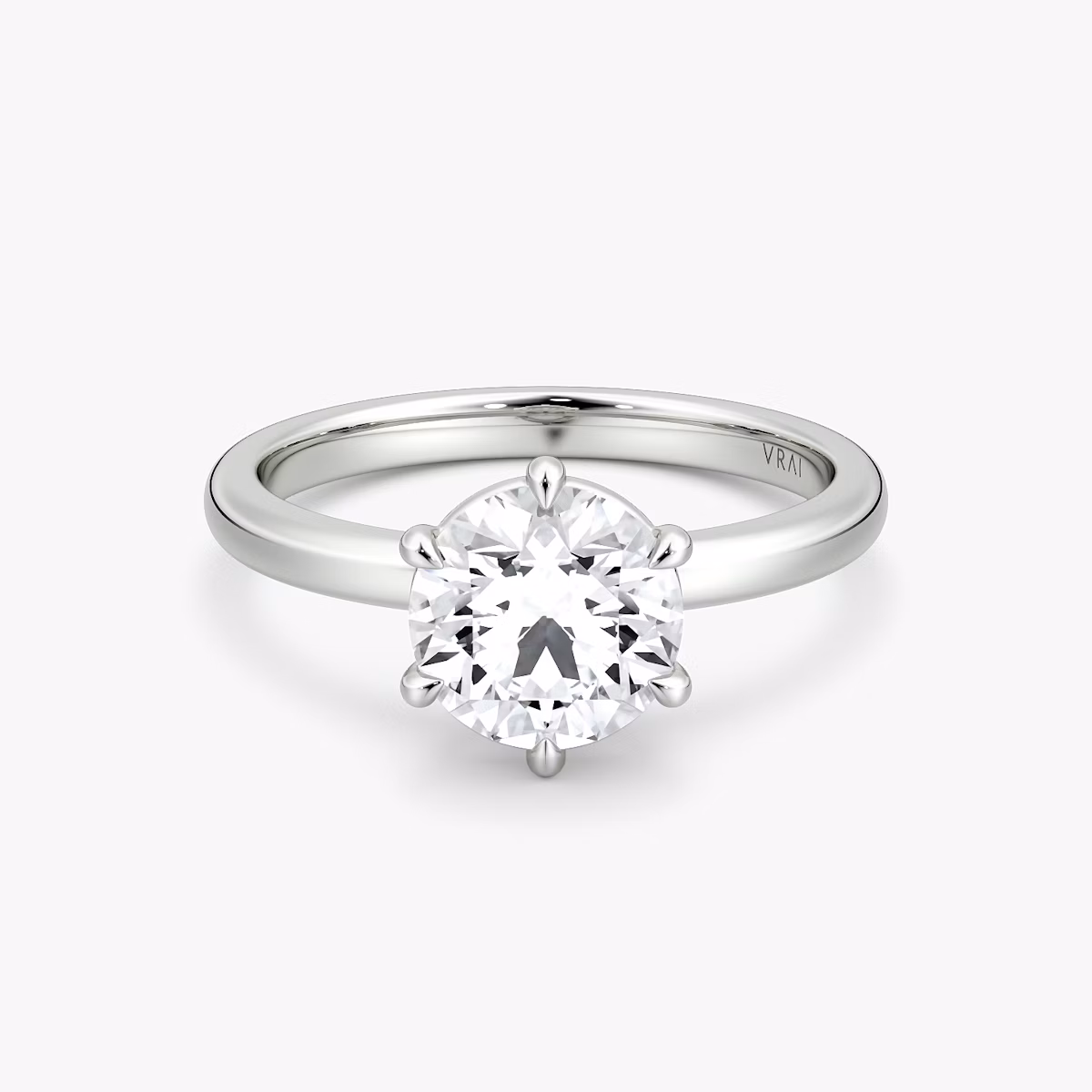 The Signature 6 Prong | Round Brilliant | 18k | White Gold | bandAccent: Plain | bandWidth: large | caratWeight: 1.0ct | hiddenHalo: no | diamondOrientation: vertical