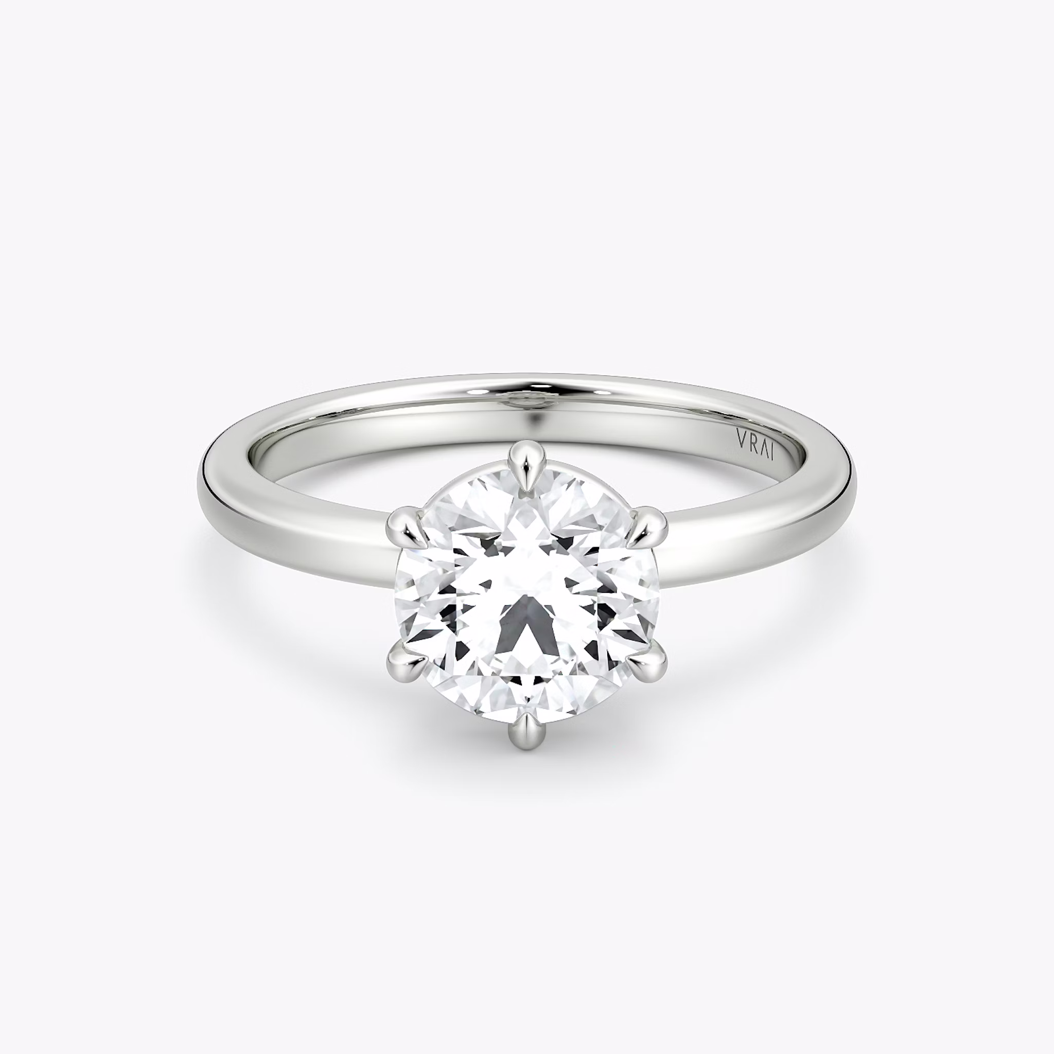 The Signature 6 Prong | Round Brilliant | 18k | White Gold | bandAccent: Plain | bandWidth: large | caratWeight: other | hiddenHalo: no | diamondOrientation: vertical
