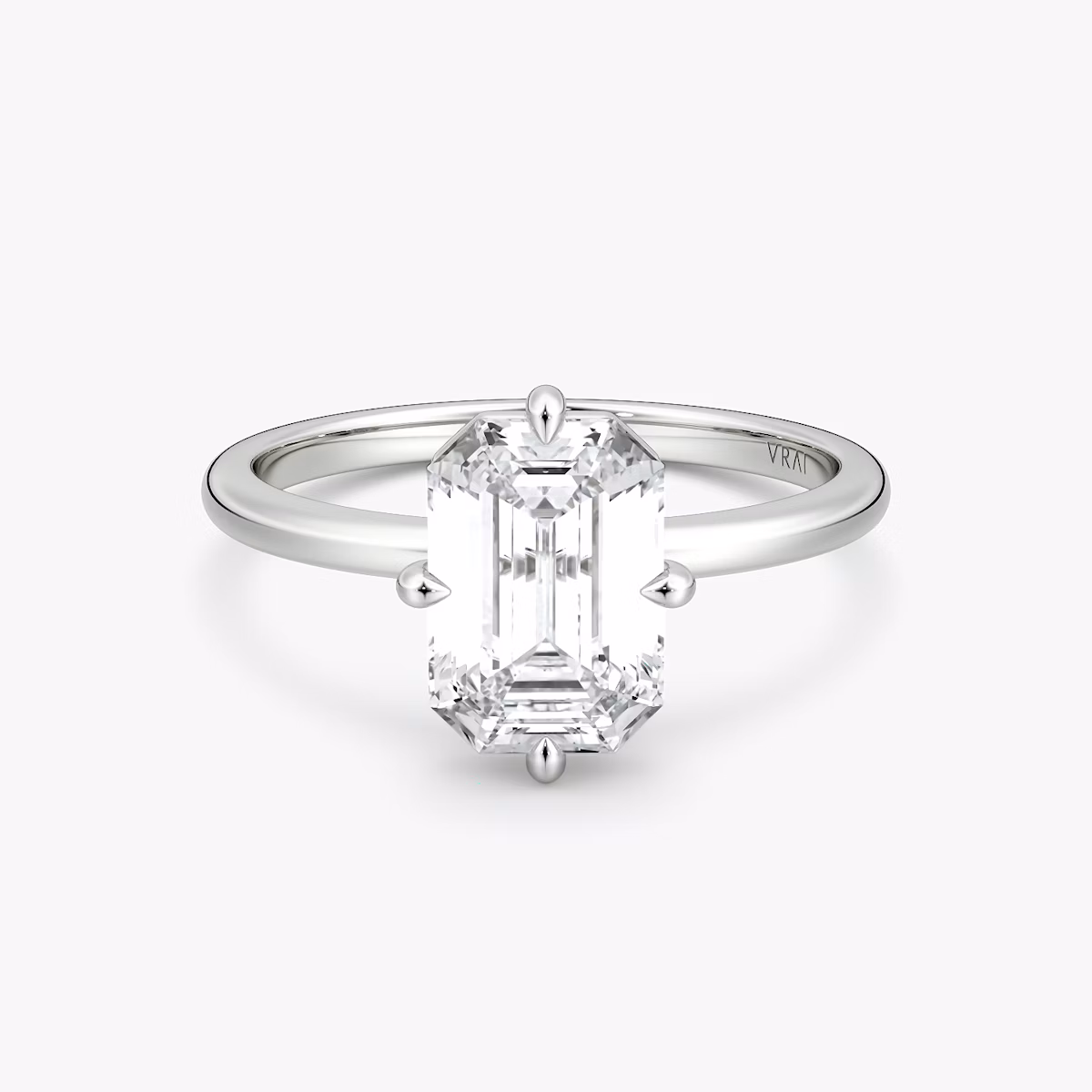 The Compass Solitaire | Emerald | Platinum | bandAccent: Plain | diamondOrientation: vertical | caratWeight: other