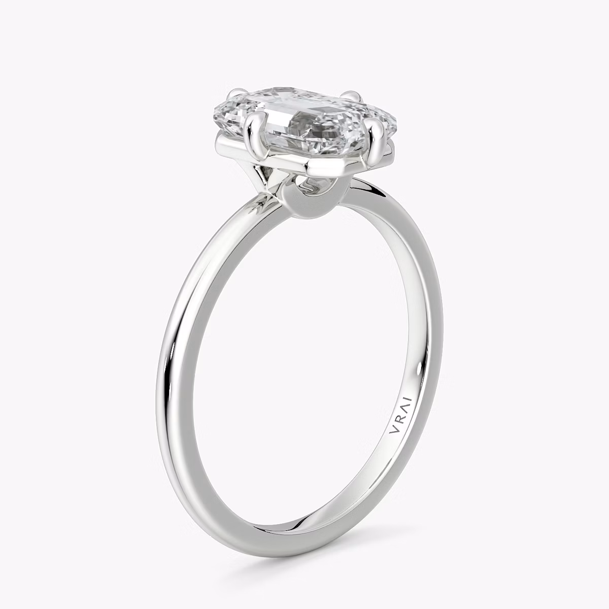 The Compass Solitaire | Emerald | Platinum | bandAccent: Plain | diamondOrientation: vertical | caratWeight: other