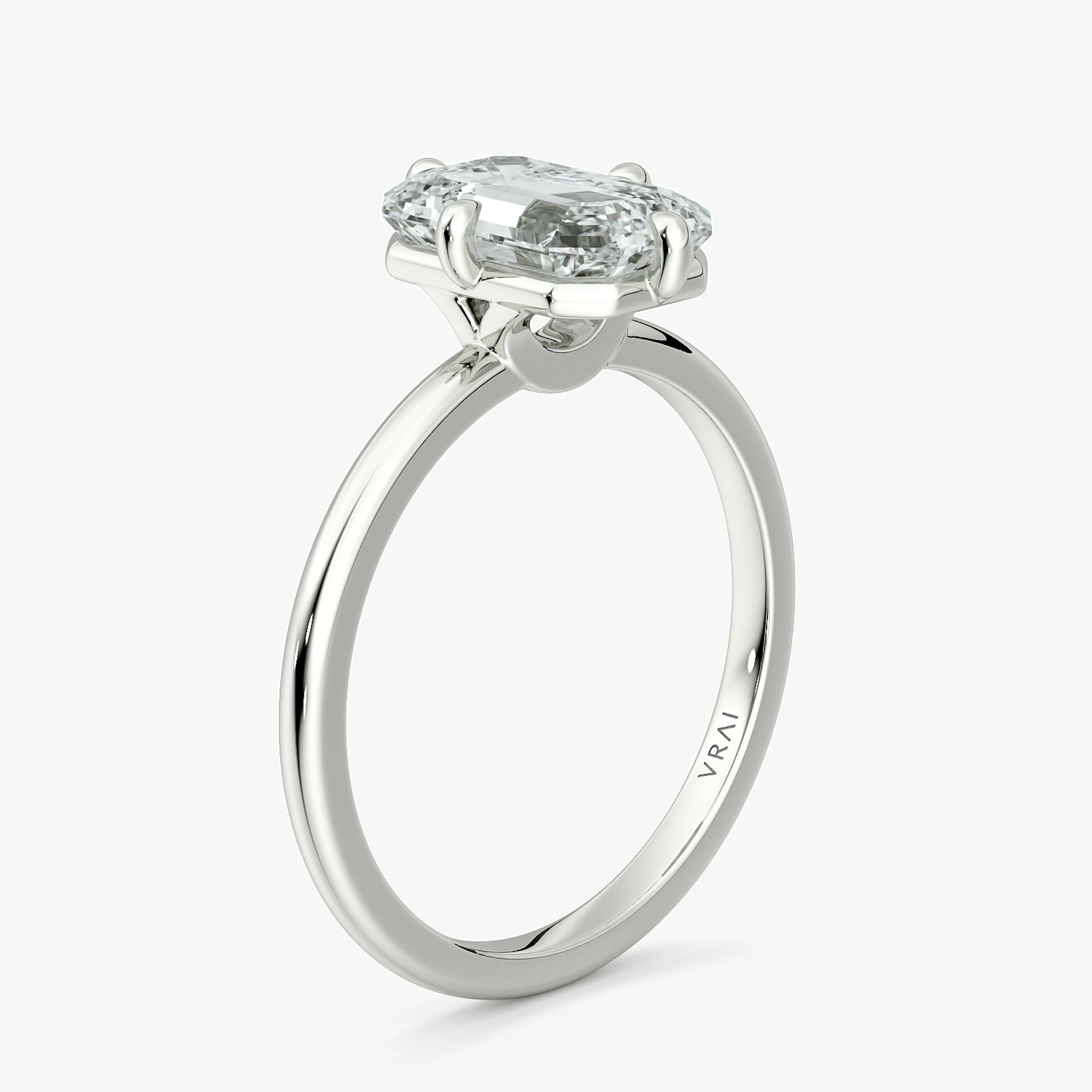 The Compass Solitaire | Emerald | 18k | White Gold | bandAccent: Plain | diamondOrientation: vertical | caratWeight: other