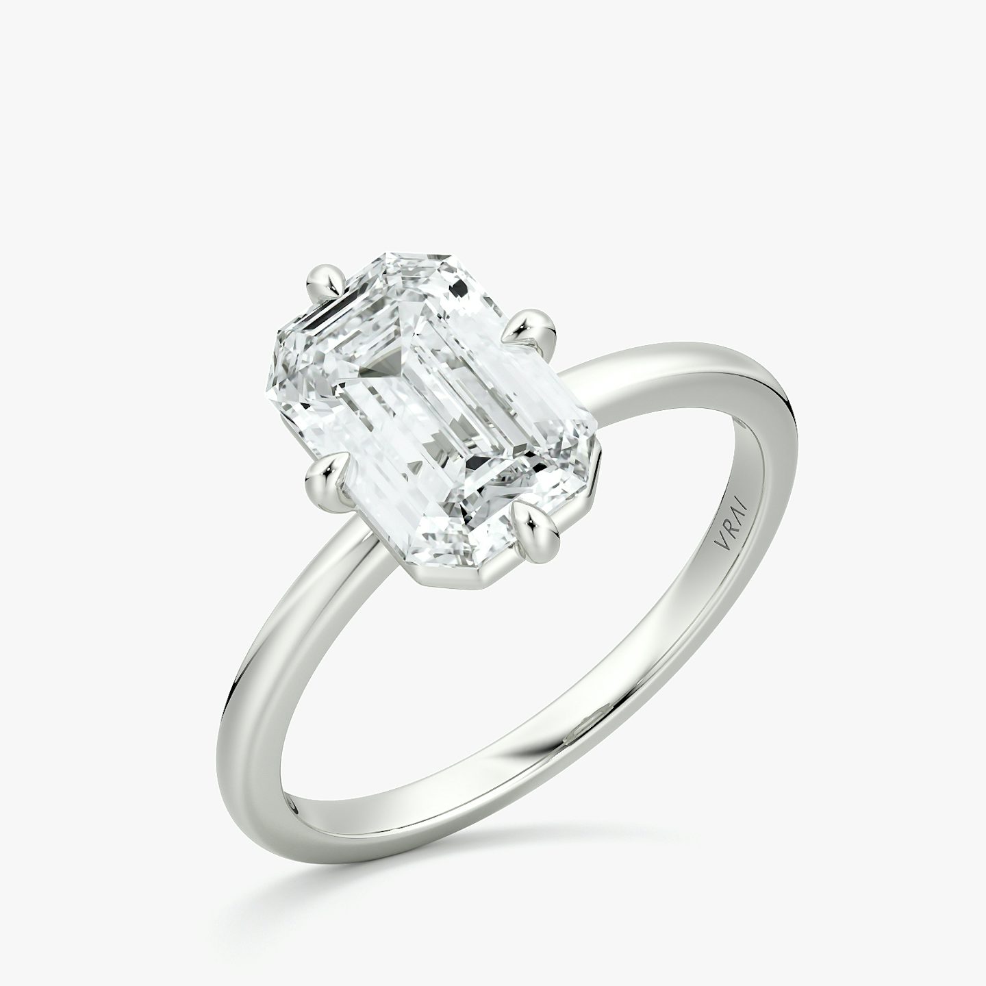 The Compass Solitaire | Emerald | 18k | White Gold | bandAccent: Plain | diamondOrientation: vertical | caratWeight: other