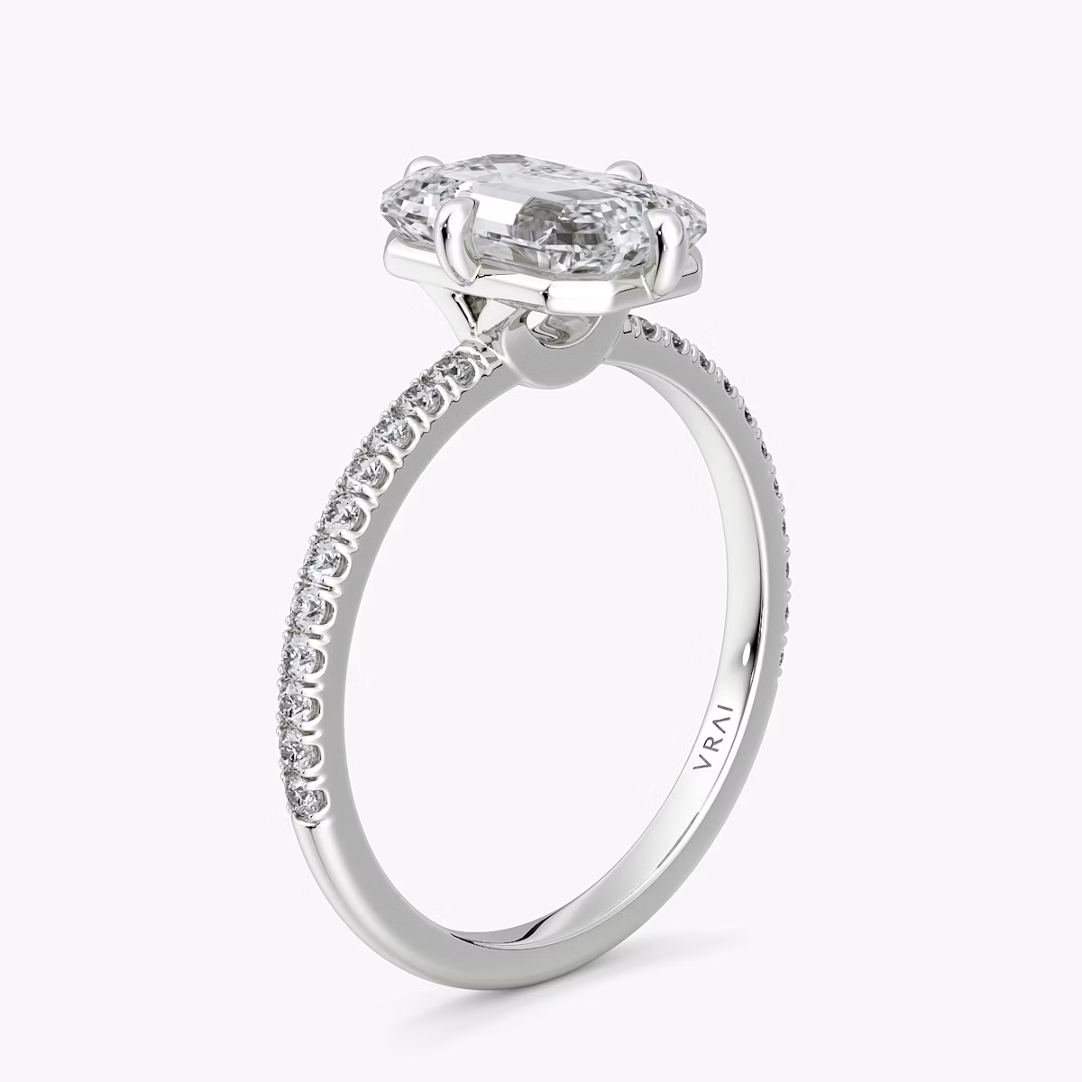 The Compass Solitaire | Emerald | Platinum | bandAccent: Pavé | diamondOrientation: vertical | caratWeight: other