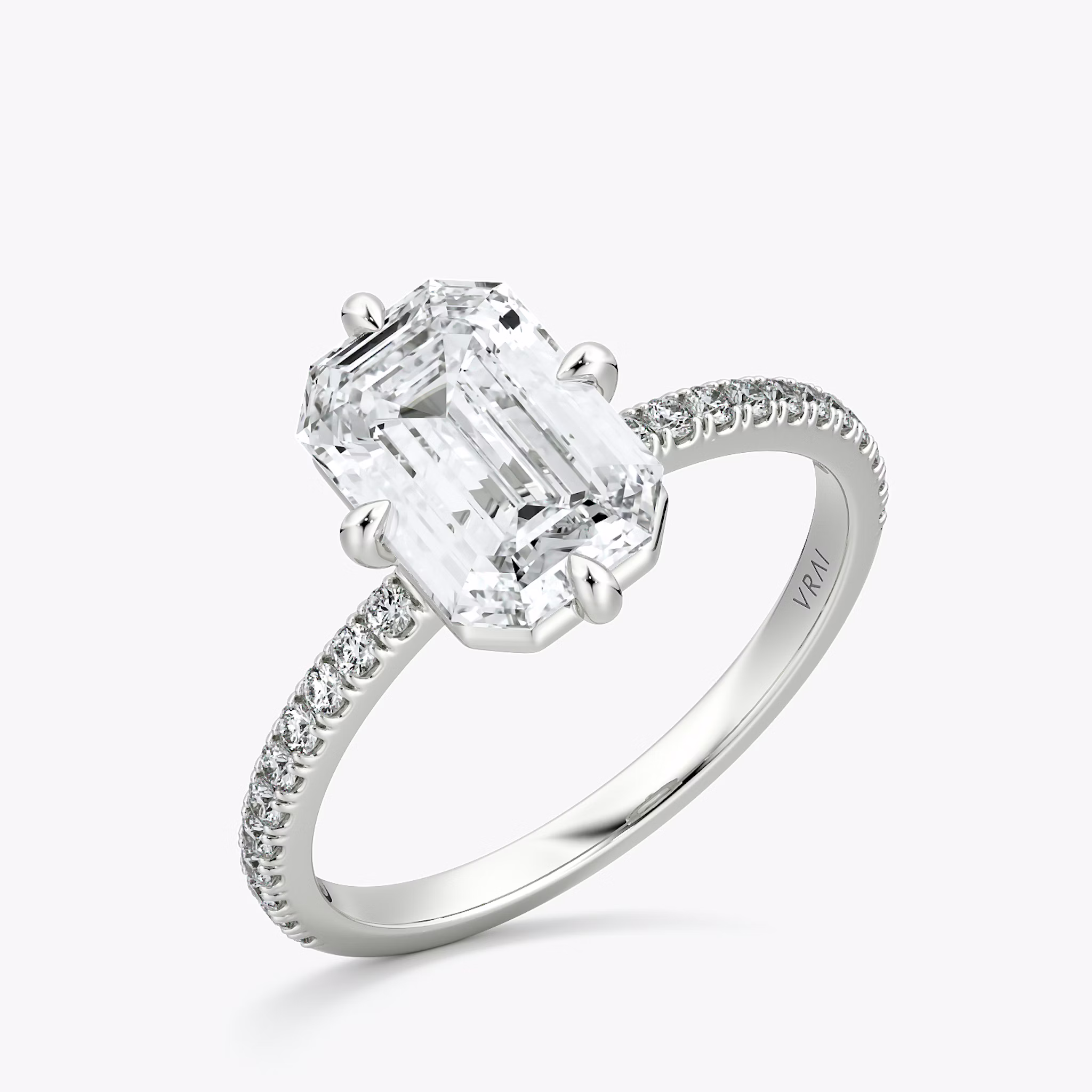 The Compass Solitaire | Emerald | 18k | White Gold | bandAccent: Pavé | diamondOrientation: vertical | caratWeight: other