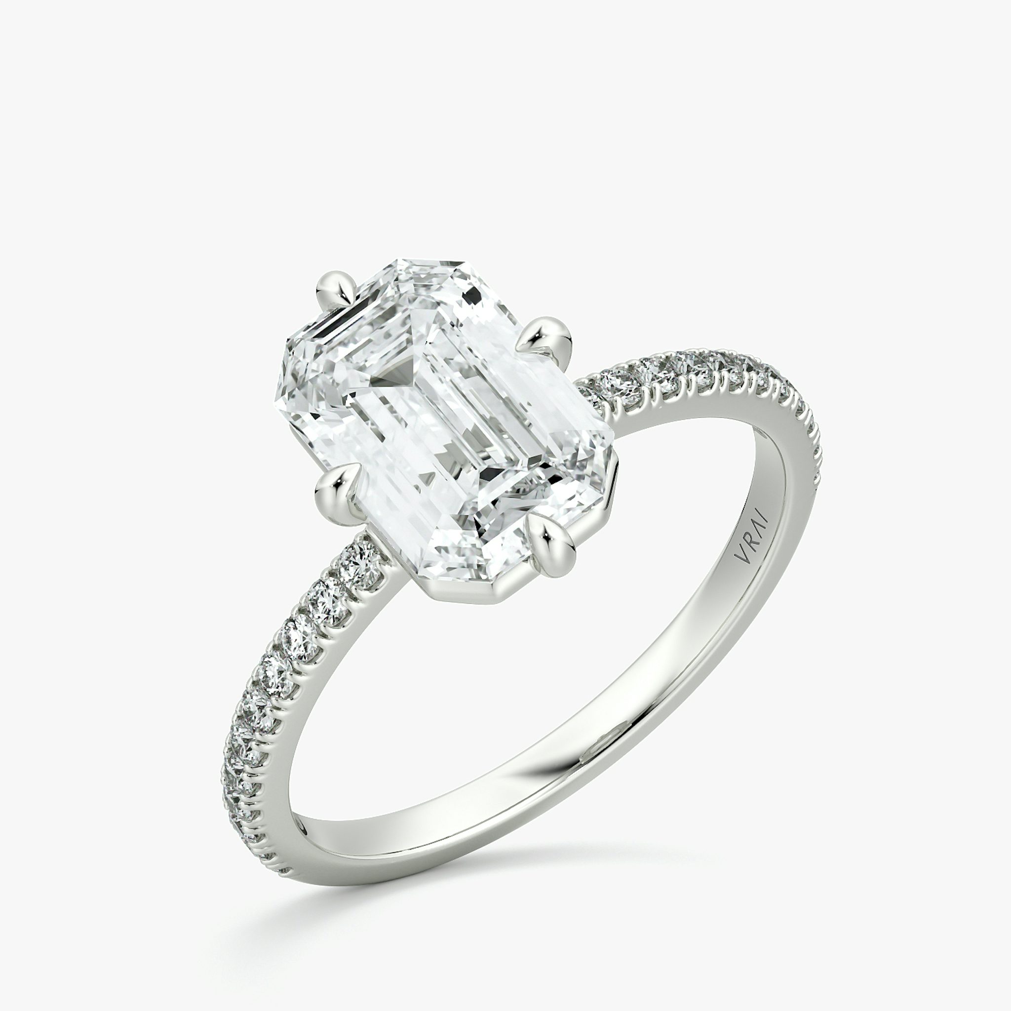 The Compass Solitaire | Emerald | 18k | White Gold | bandAccent: Pavé | diamondOrientation: vertical | caratWeight: other